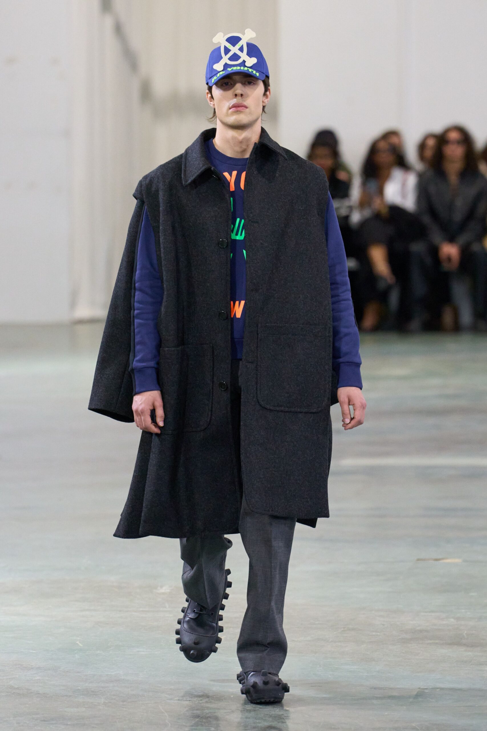 black wool coat with blue shirt