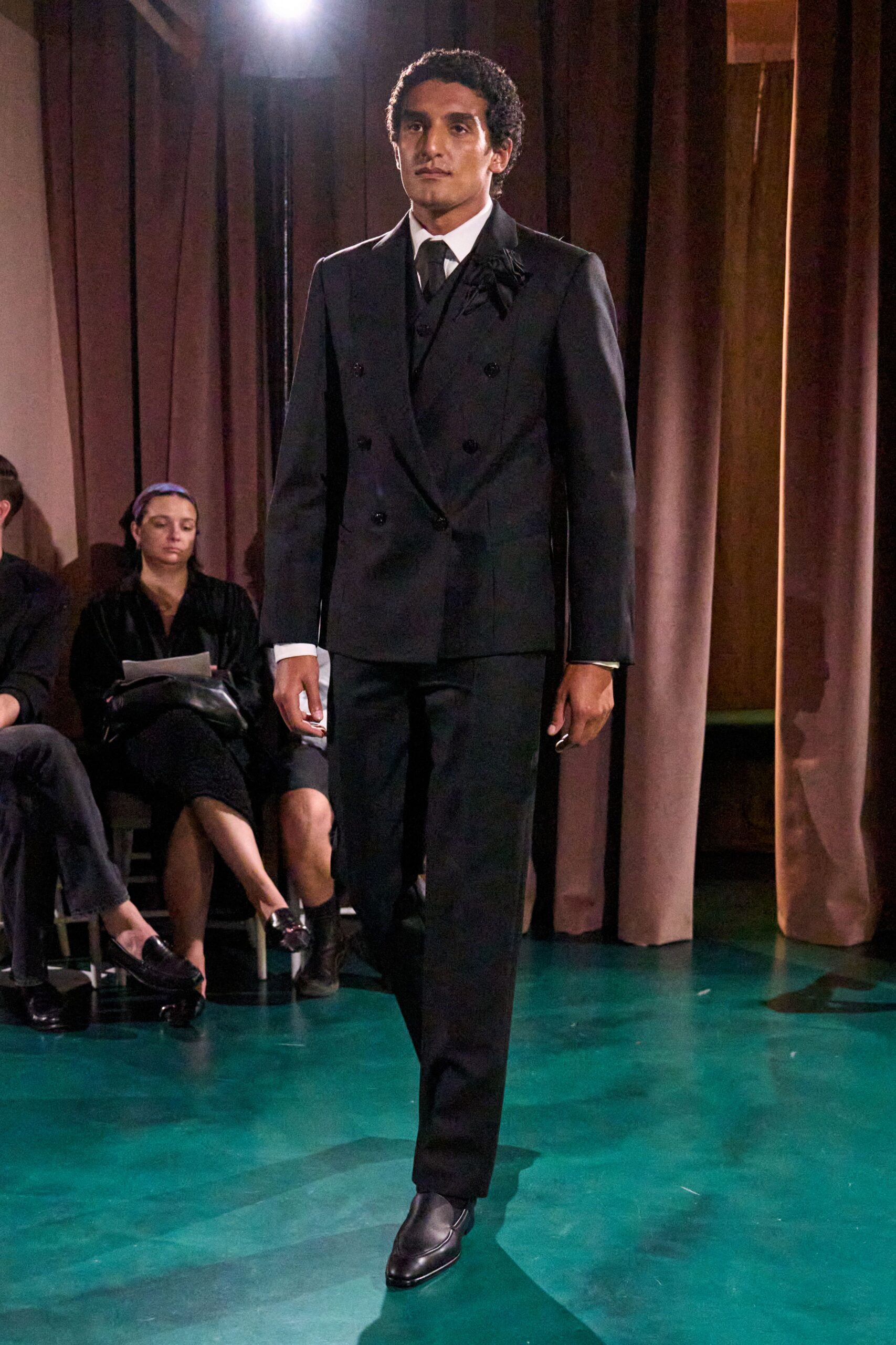 black tailored suit with leather shoes
