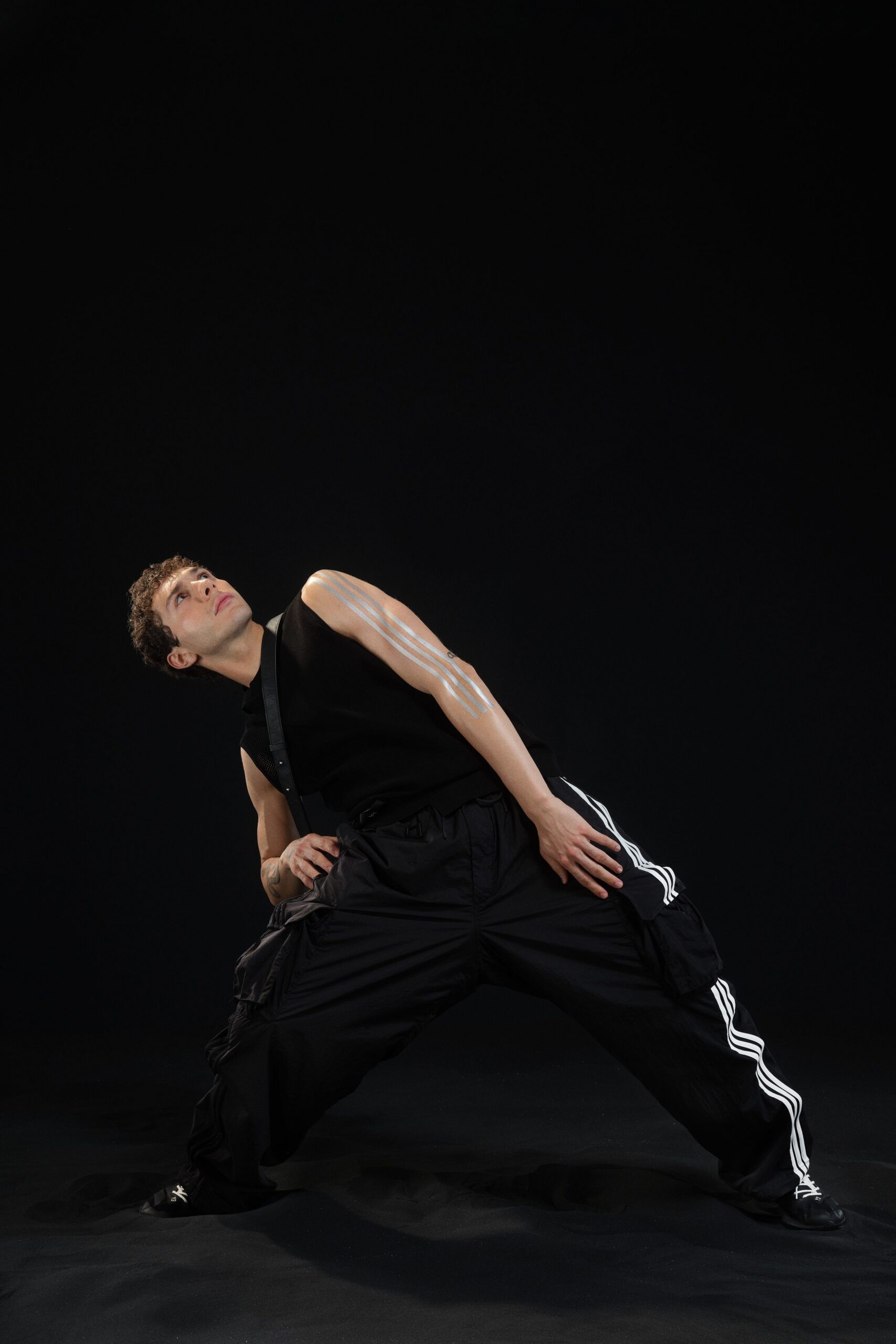 black fitted top and relaxed pants
