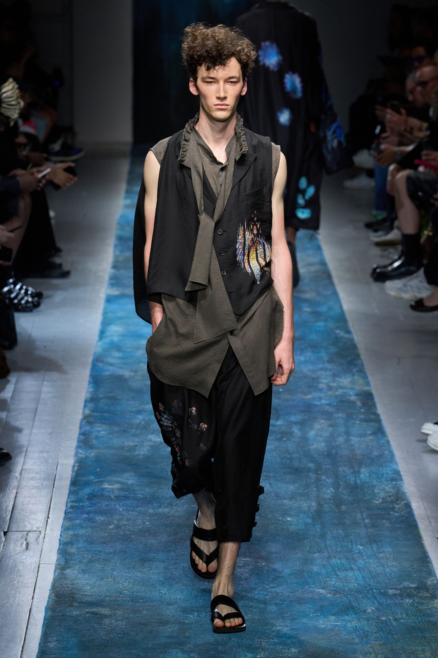 black vest gray shirt relaxed pants