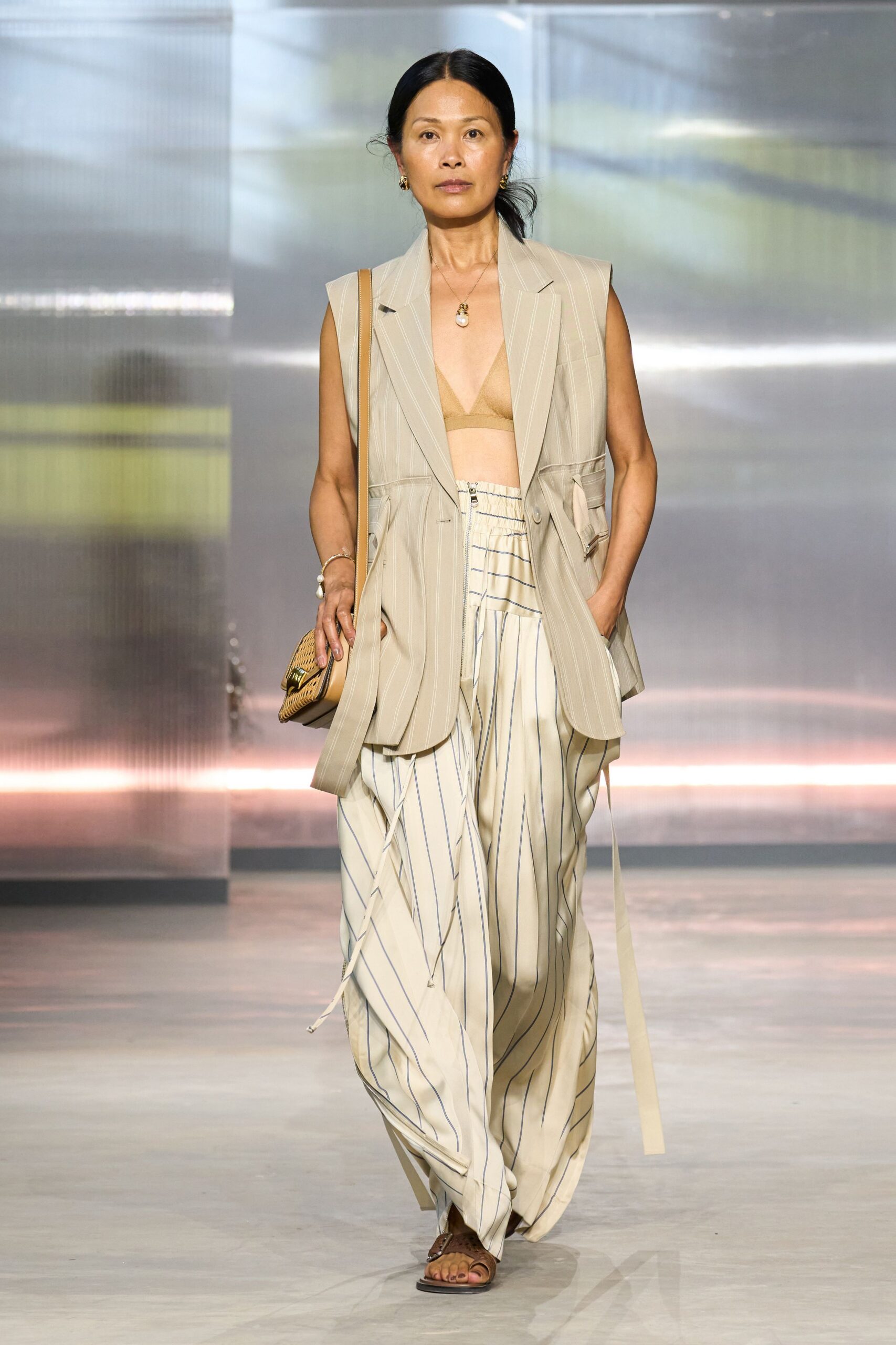 beige cotton sleeveless collared relaxed buttoned vest