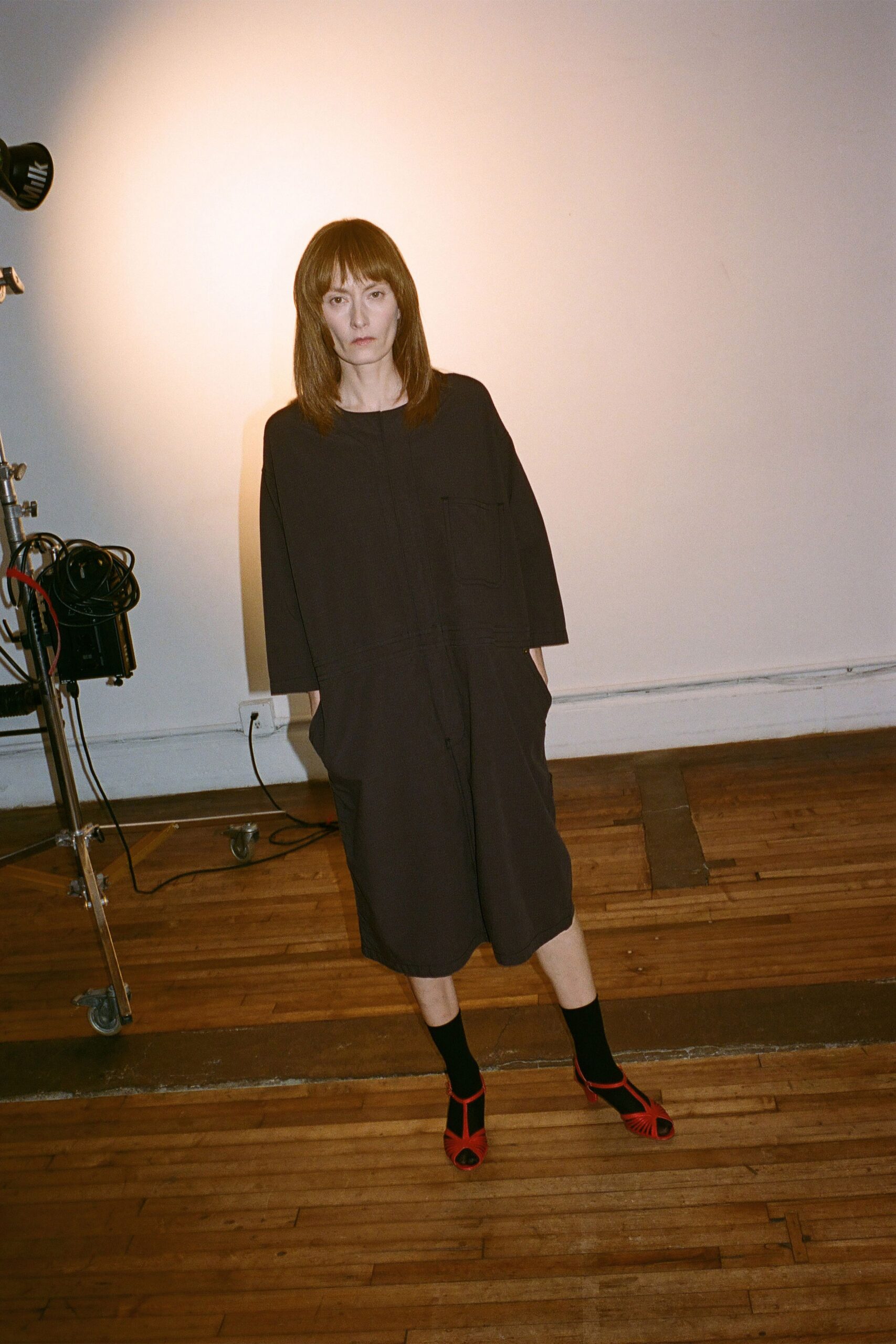 black cotton short-sleeve relaxed pockets jumpsuit