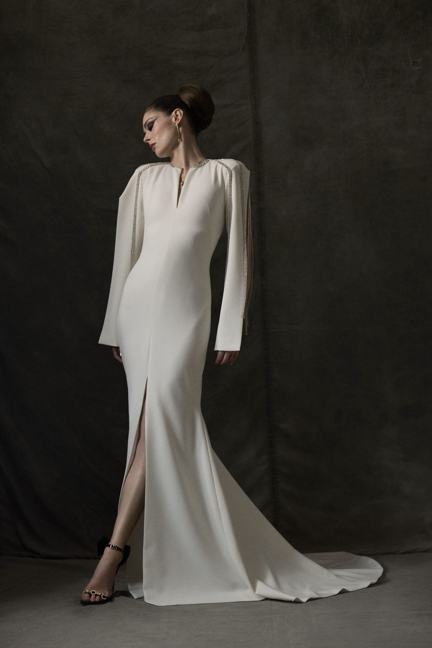 white silk long-sleeve v-neck fitted draped maxi gown