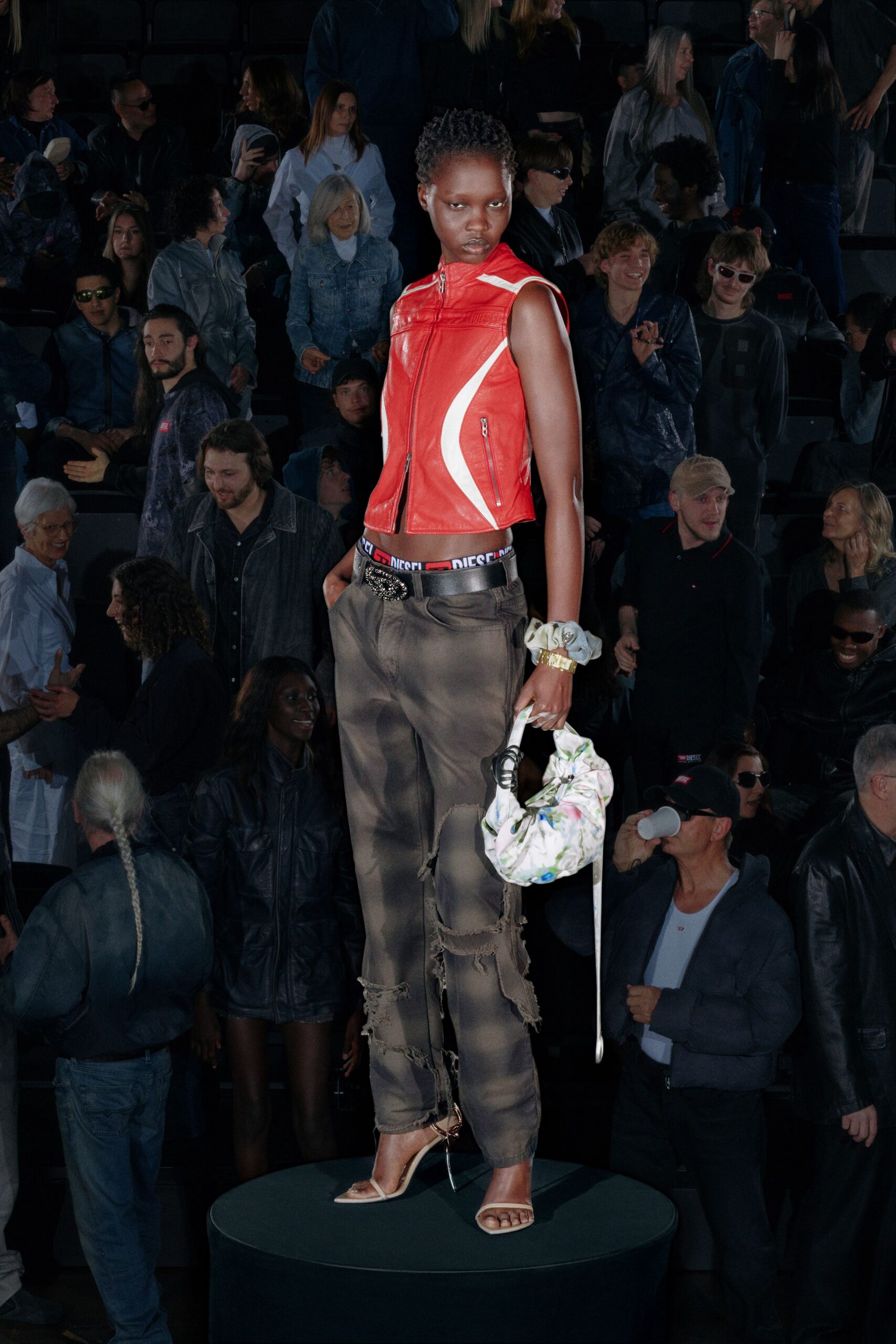 red leather sleeveless high-neck fitted top