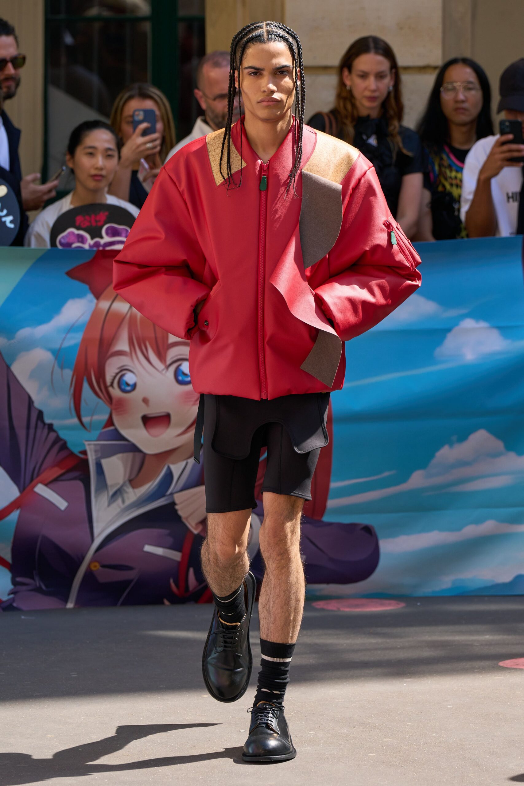 red oversized jacket with black shorts