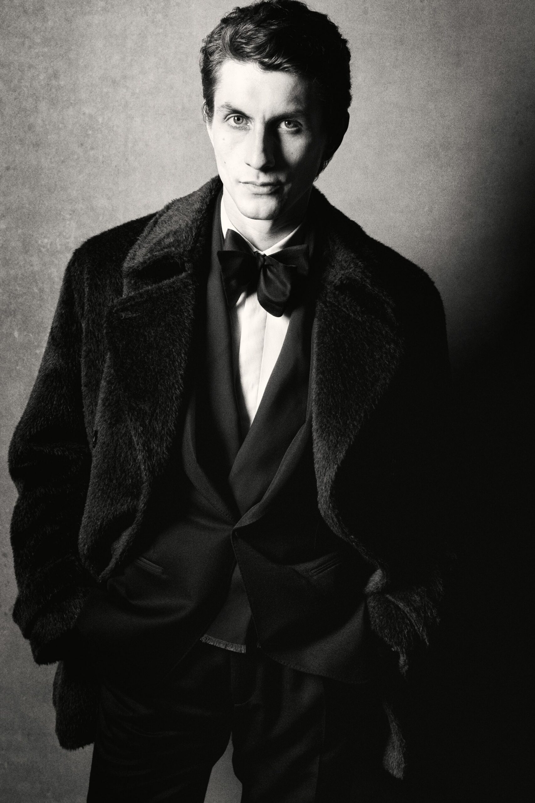 black fur coat and suit