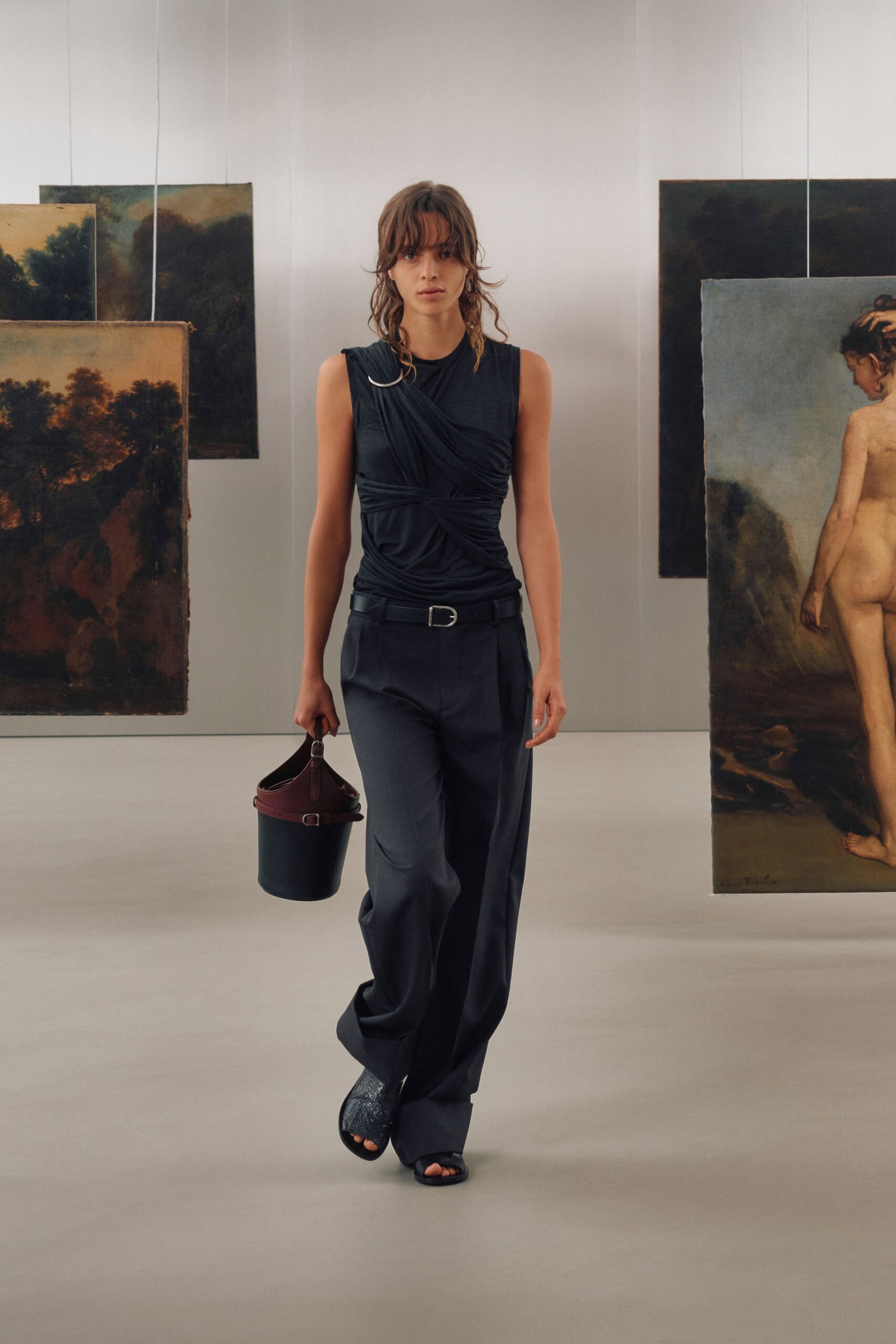 black silk sleeveless top with wide-leg pants