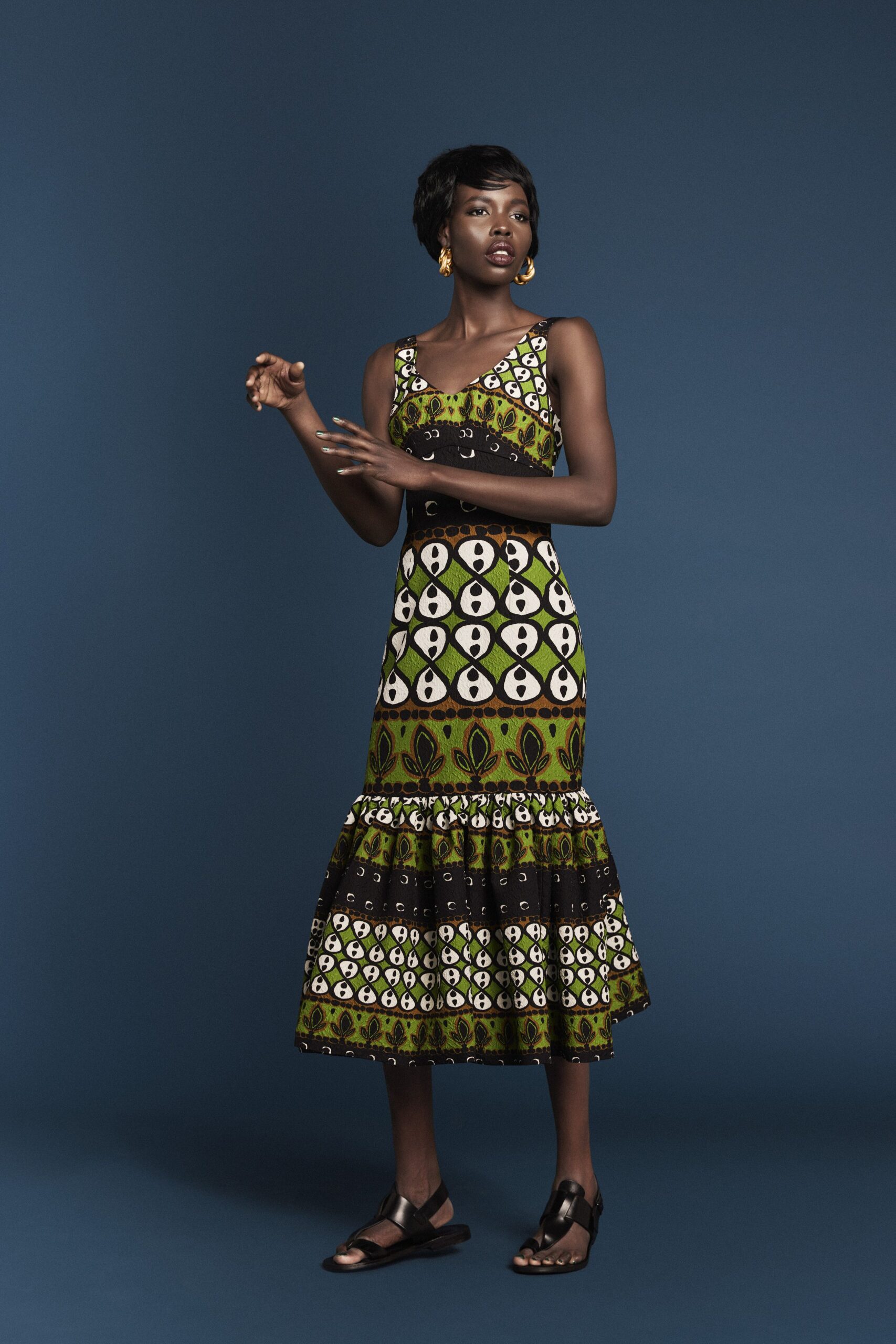green cotton sleeveless v-neck fitted tiered printed dress