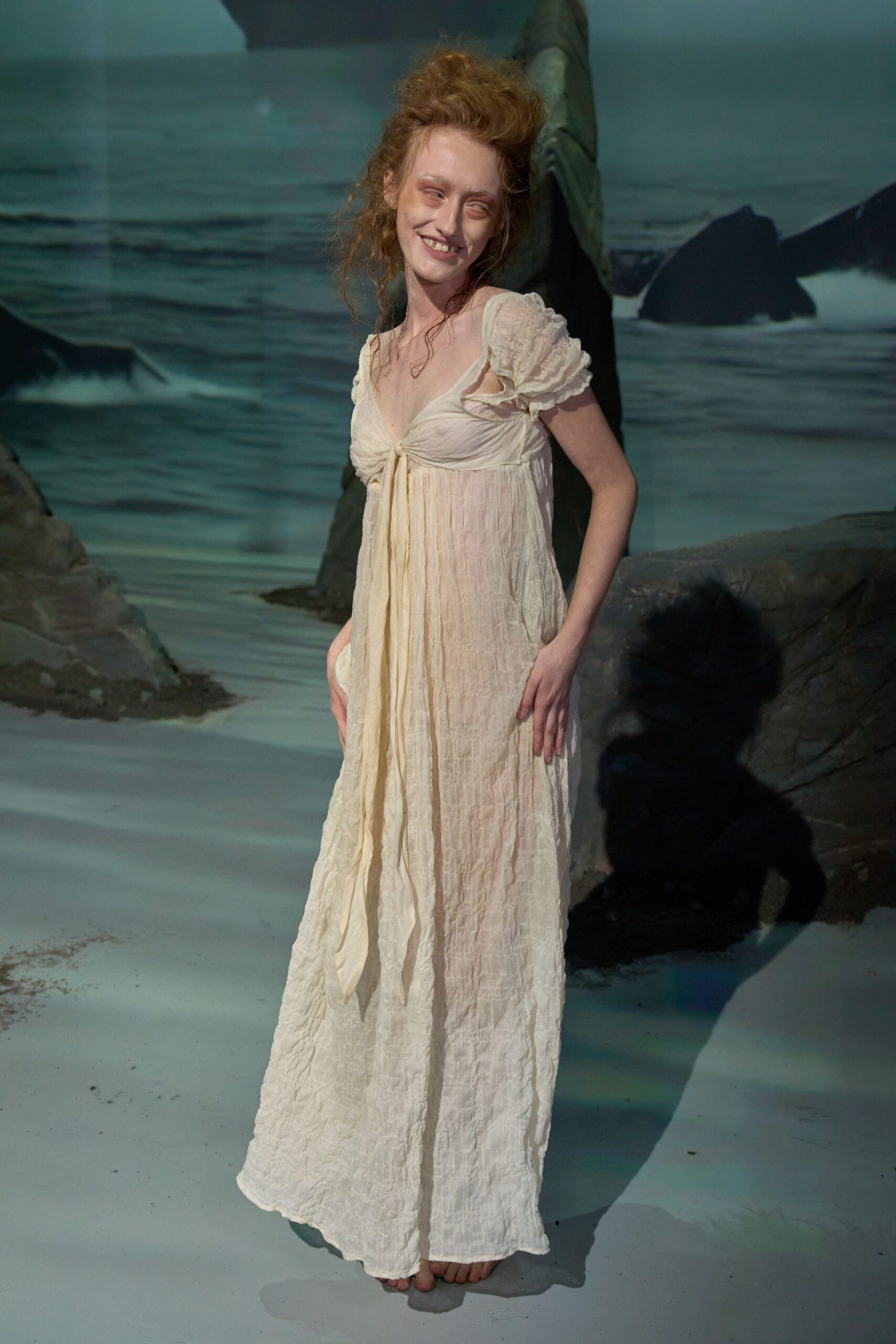 ivory relaxed sleeveless gown