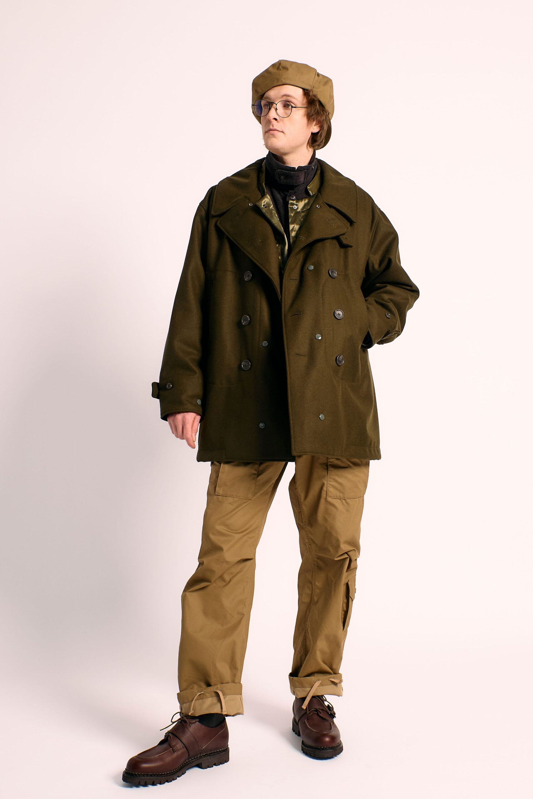 green wool coat beige pants