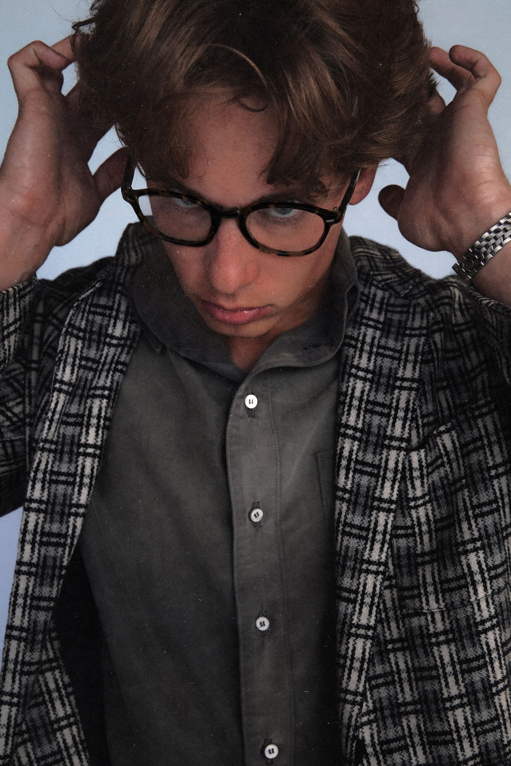 gray shirt with checked jacket