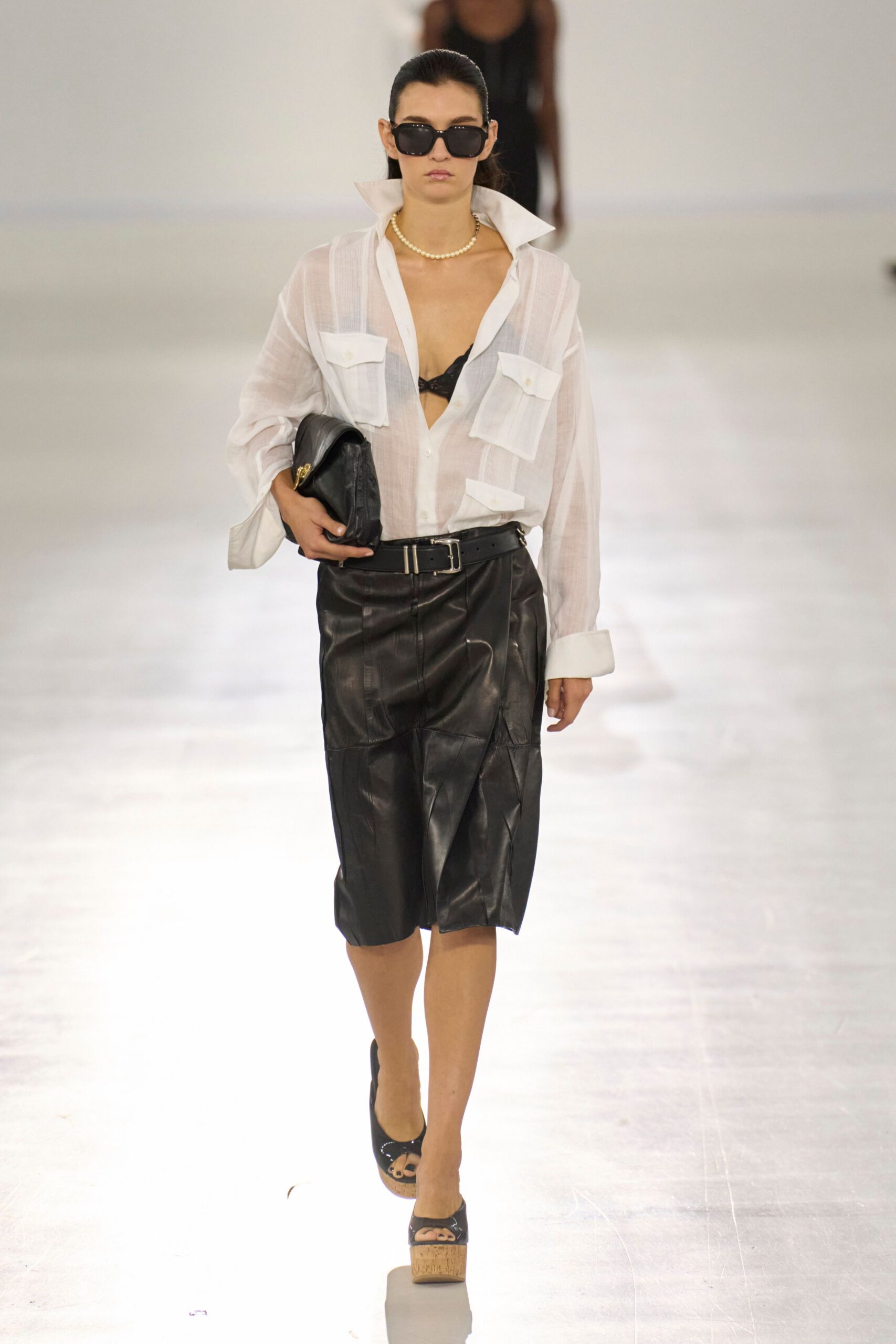 white relaxed shirt black leather skirt