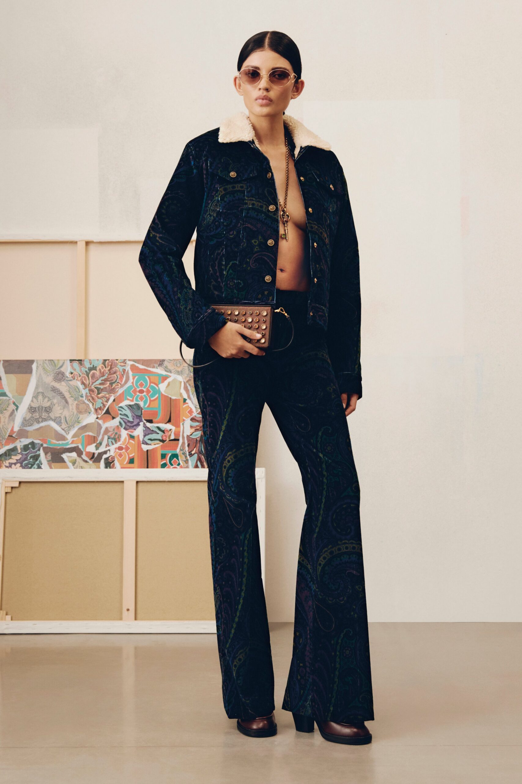 black denim jacket and flared pants