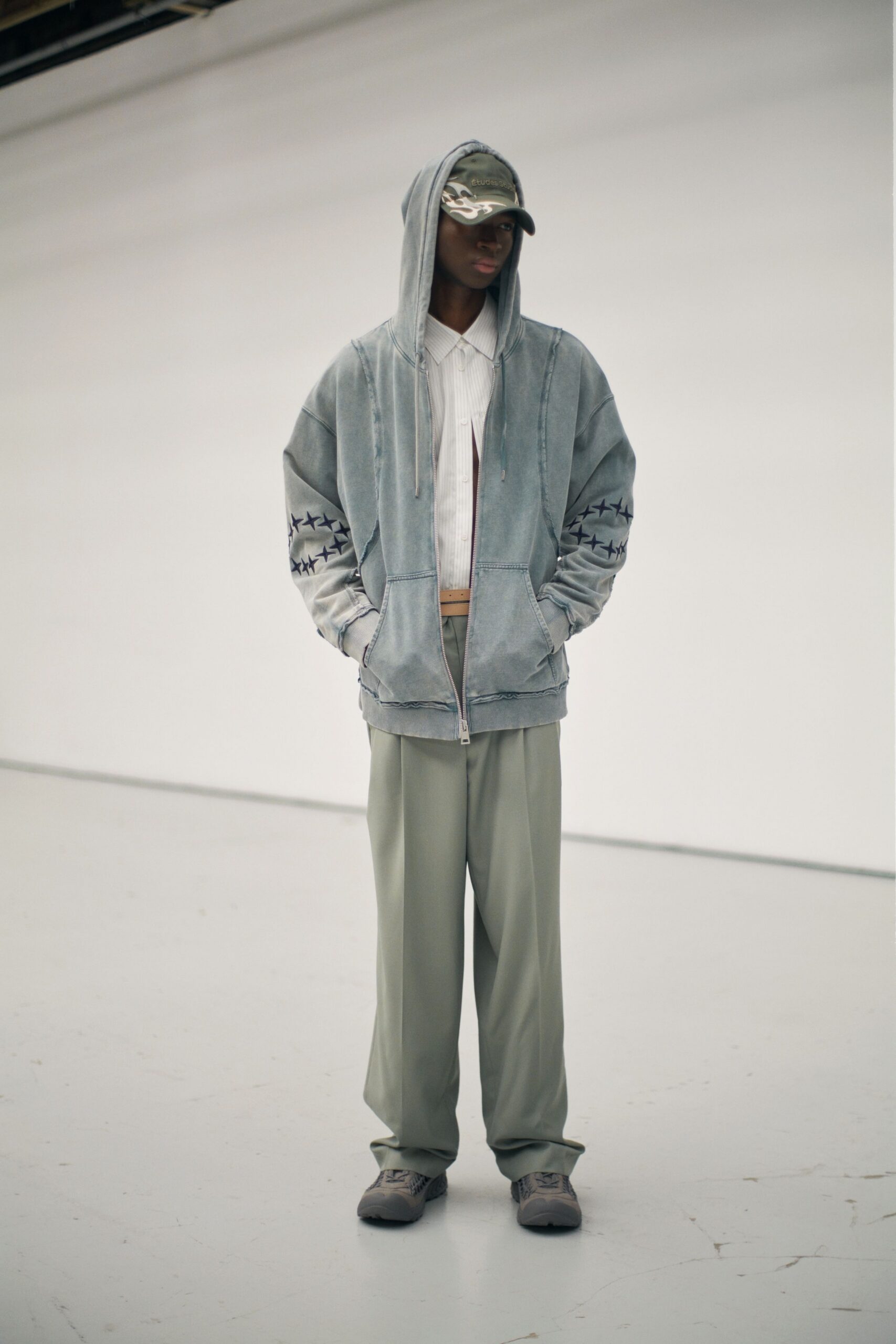 gray hoodie with camouflage cap