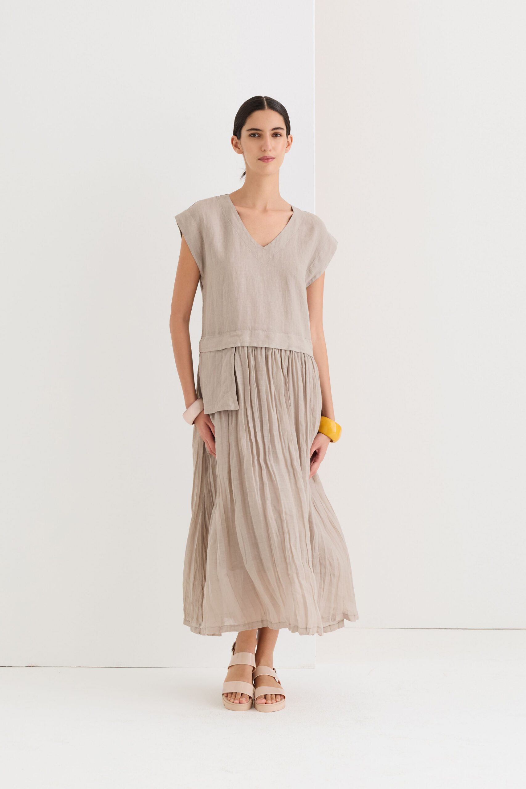 beige cotton sleeveless v-neck relaxed pleated maxi dress