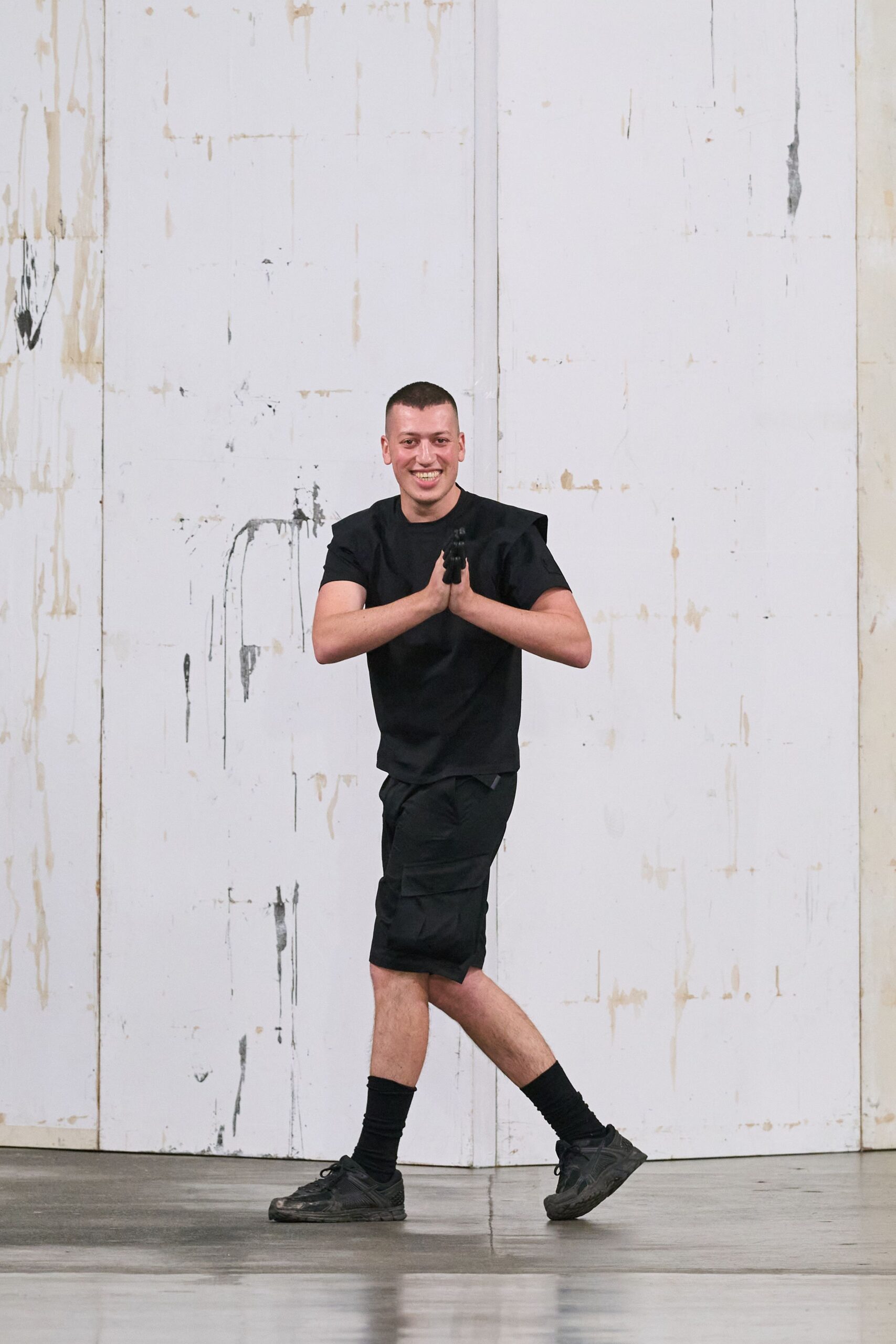 black t-shirt and cargo shorts