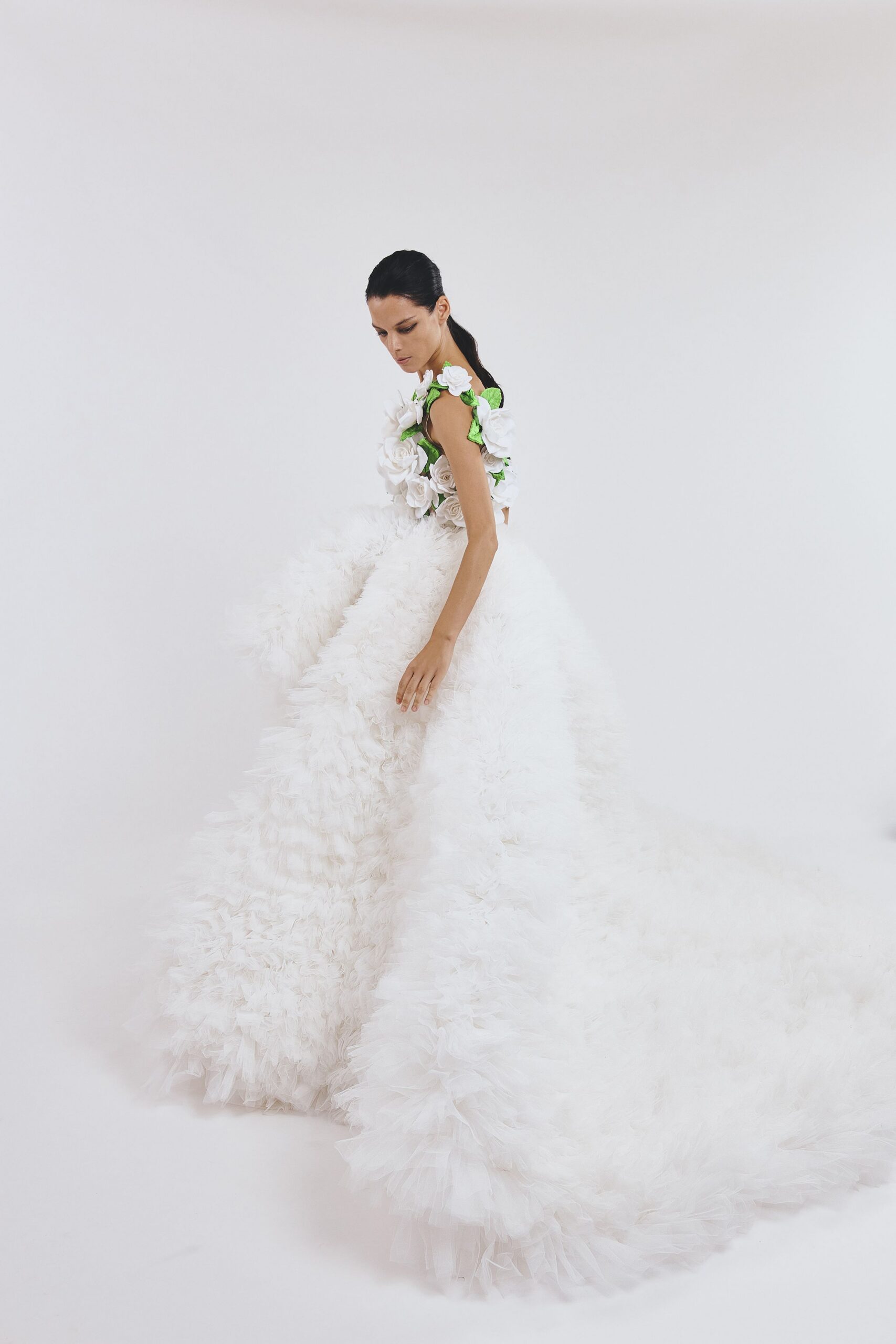 white ruffled tulle gown