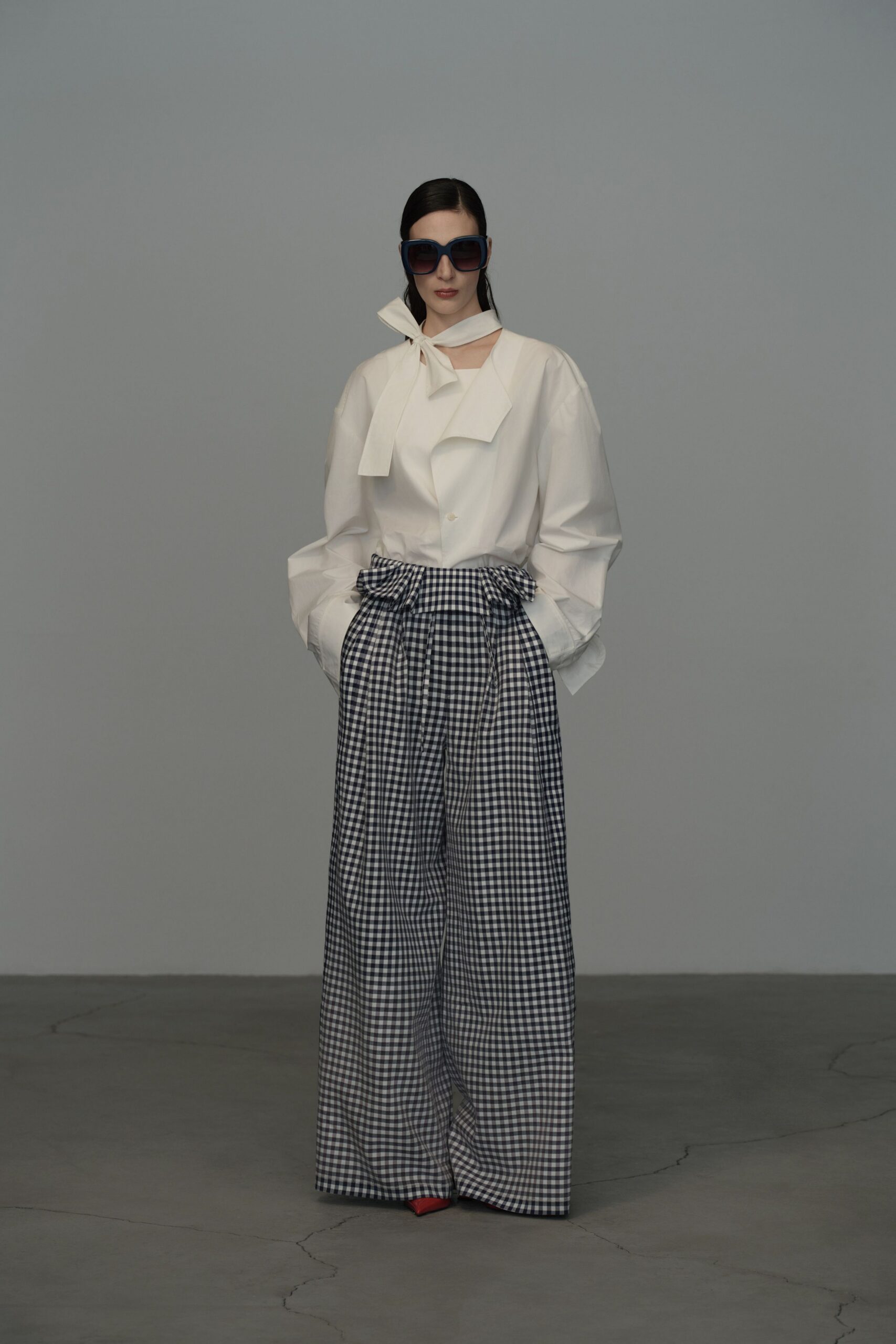 white shirt blue checked pants