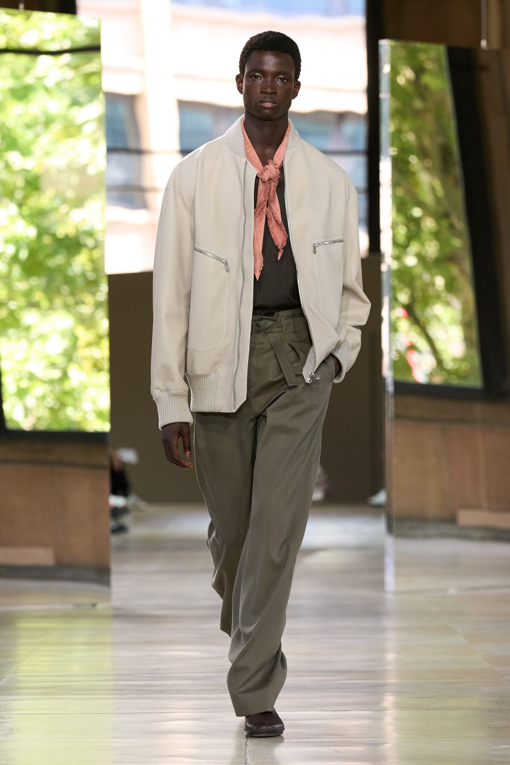 white relaxed jacket with green pants