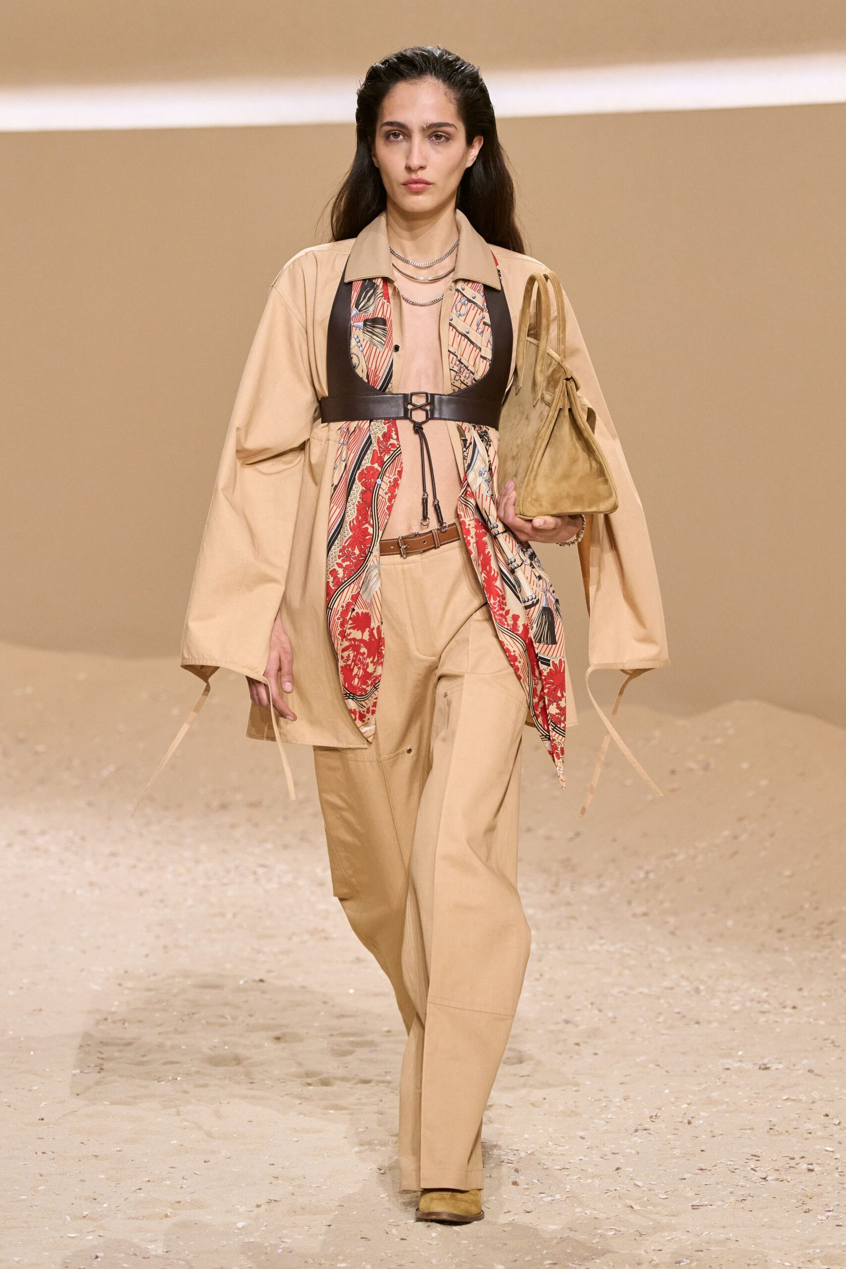 beige relaxed top with embroidered details