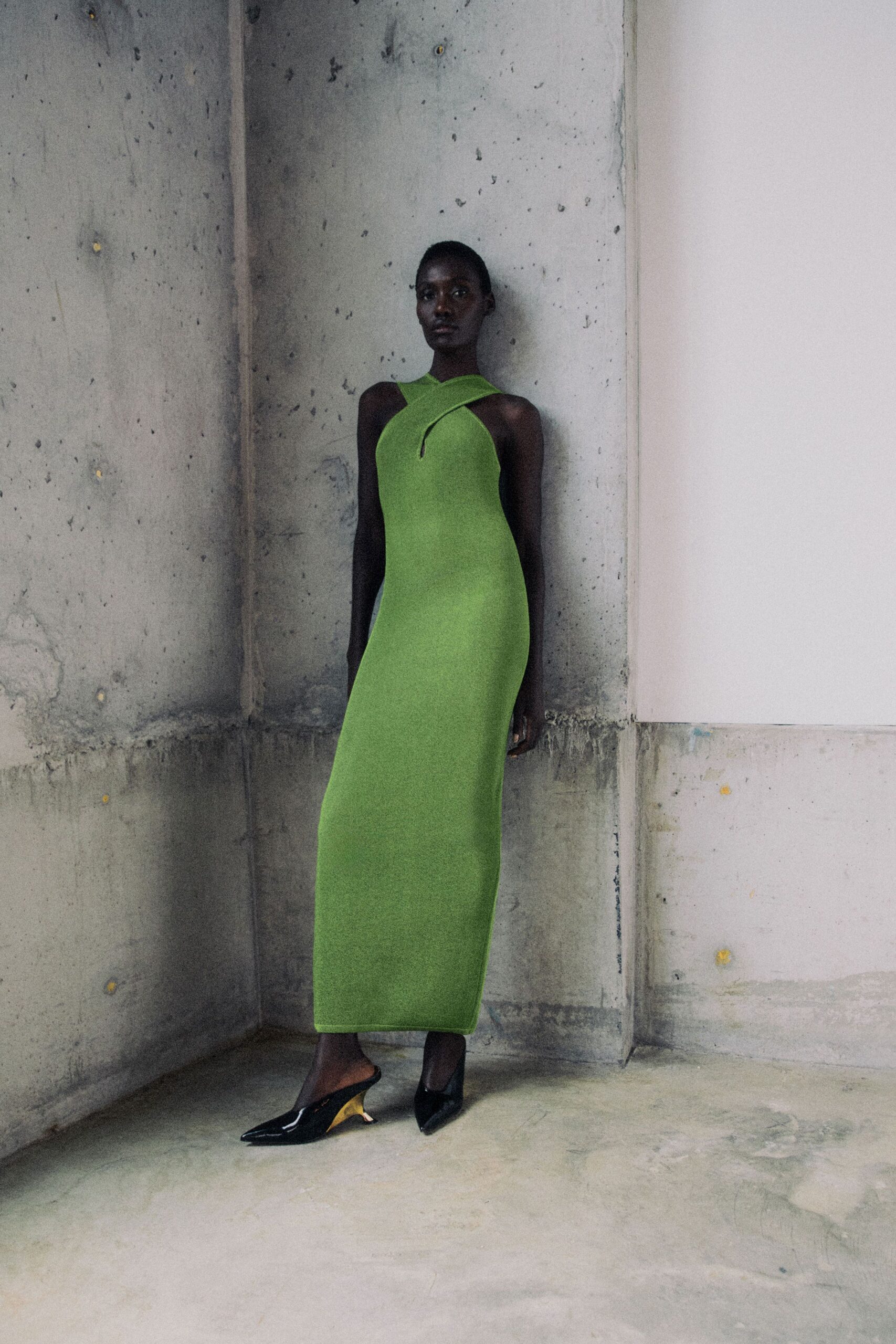 green knit sleeveless high-neck fitted straight-leg maxi gown