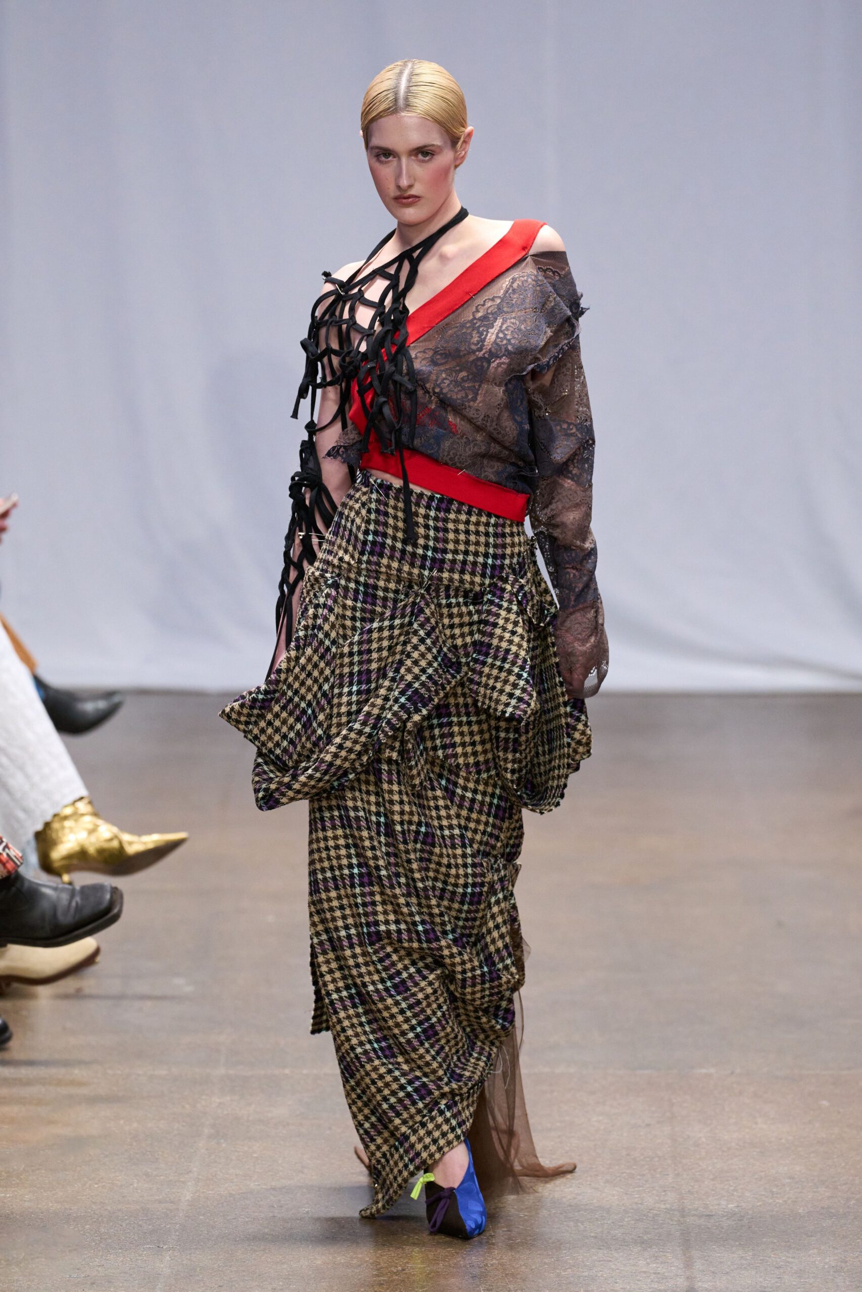 black and red layered top with pleated skirt
