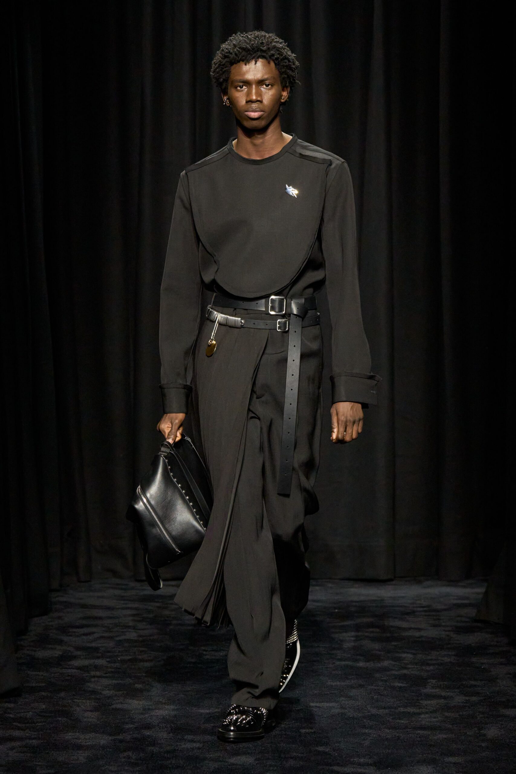 black fitted top and relaxed pants