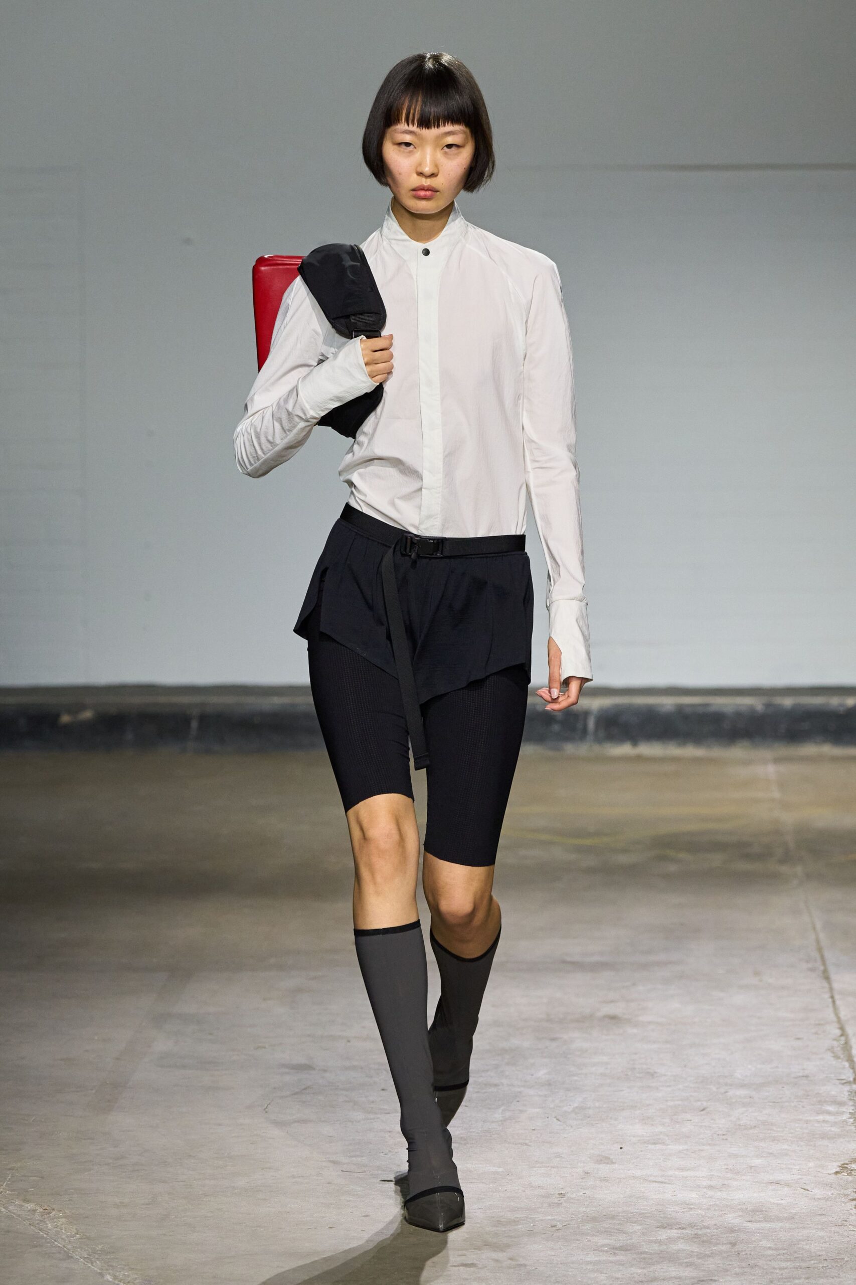 white fitted shirt with black skirt