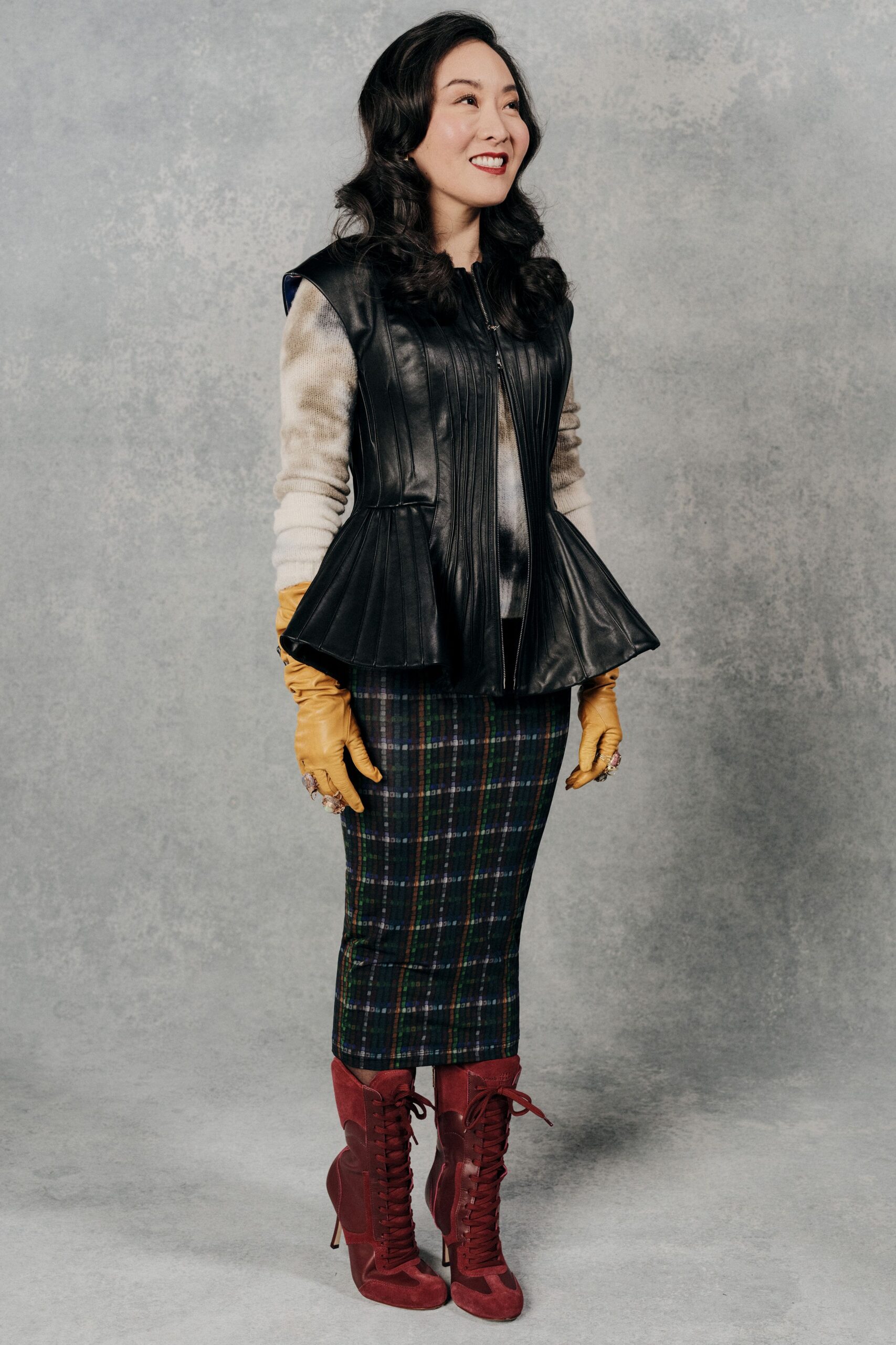 black leather long-sleeve collared fitted pleated jacket