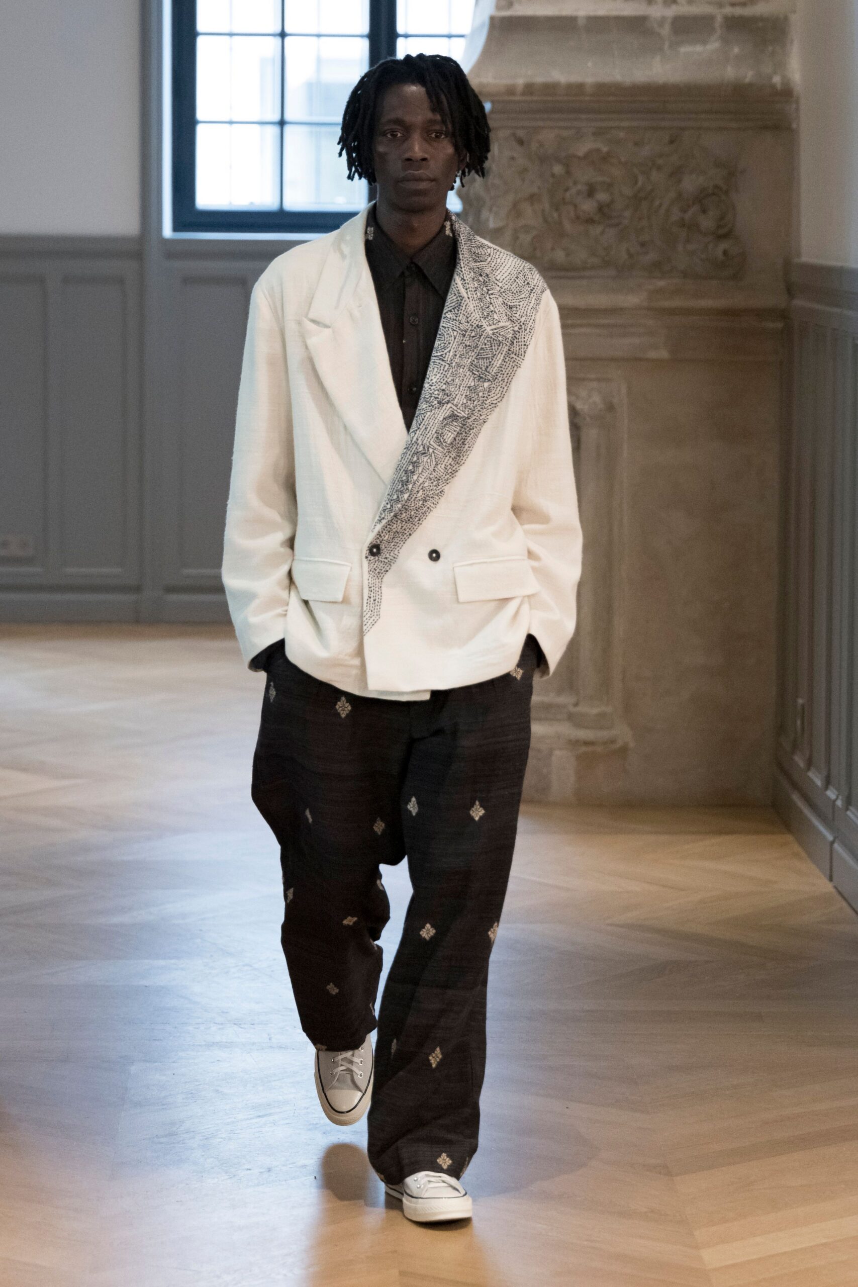 white tailored blazer with black shirt