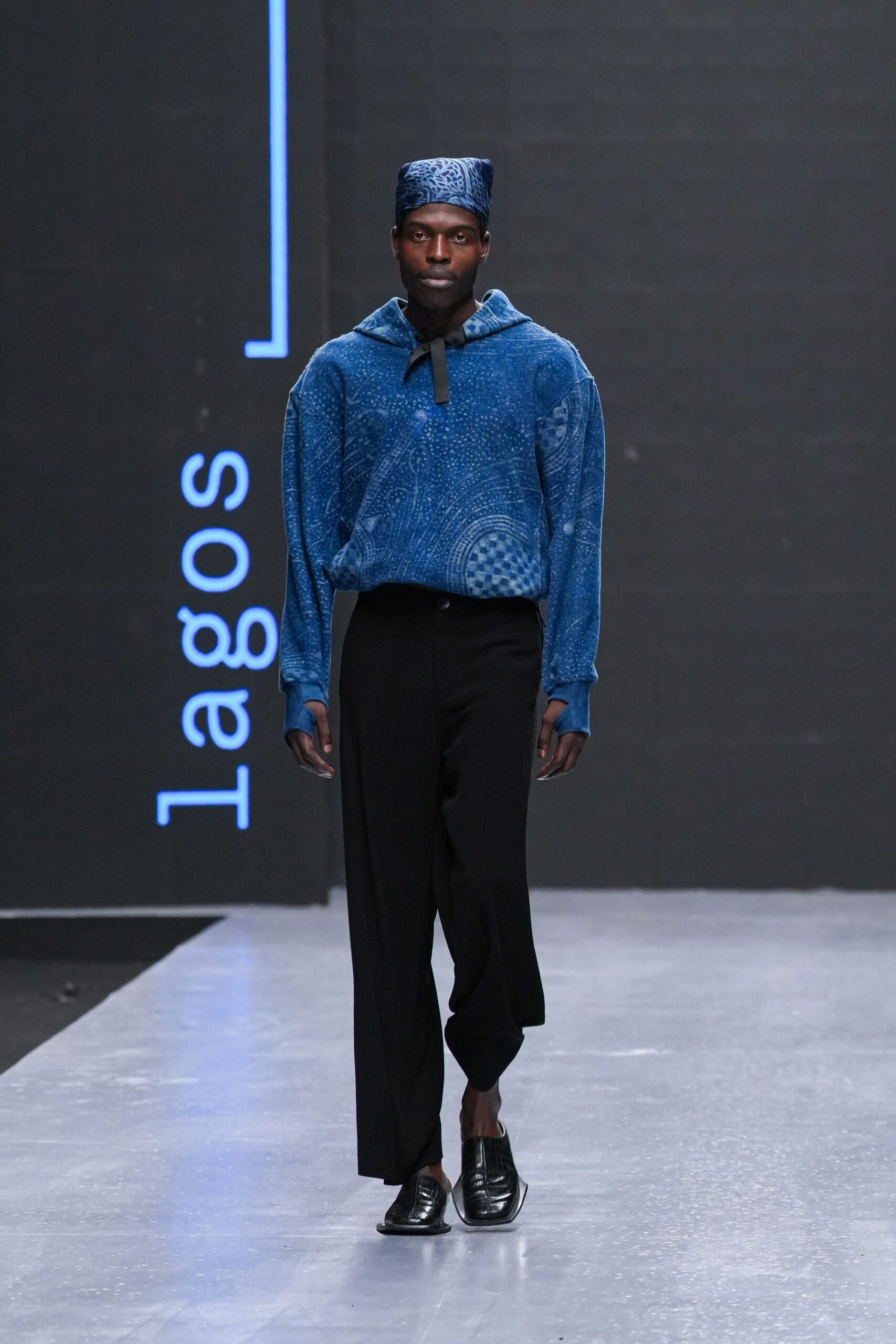 blue hoodie and black pants
