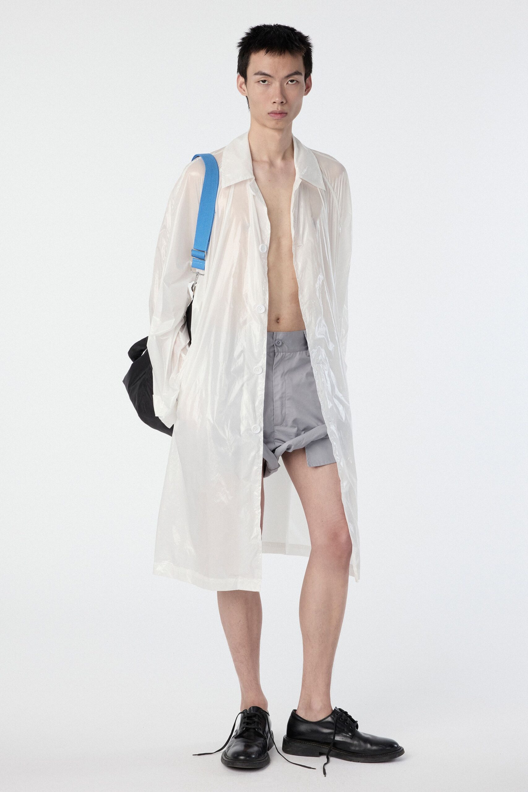 white vinyl long-sleeve collared relaxed zippered shiny coat