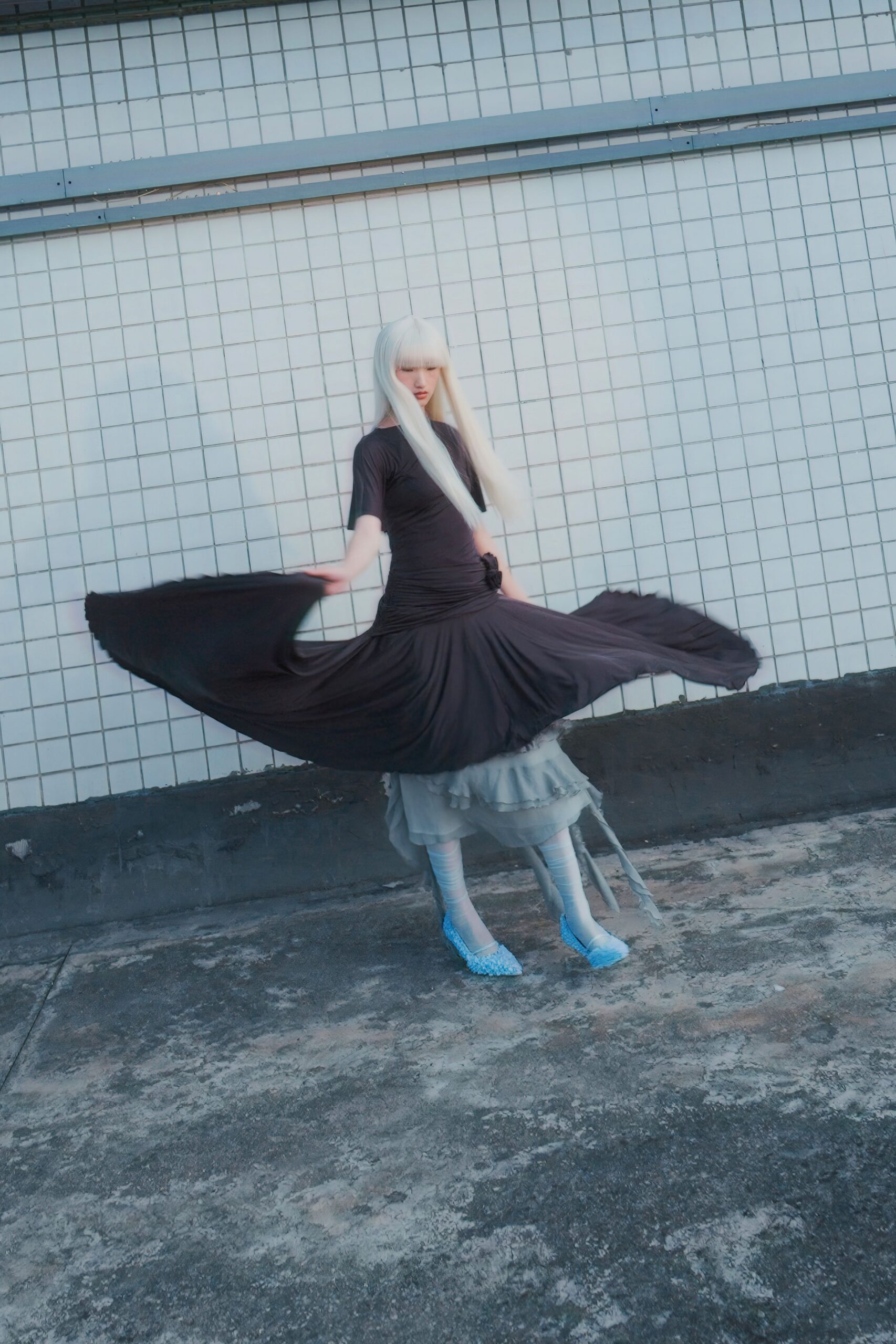 black fitted dress with gray skirt