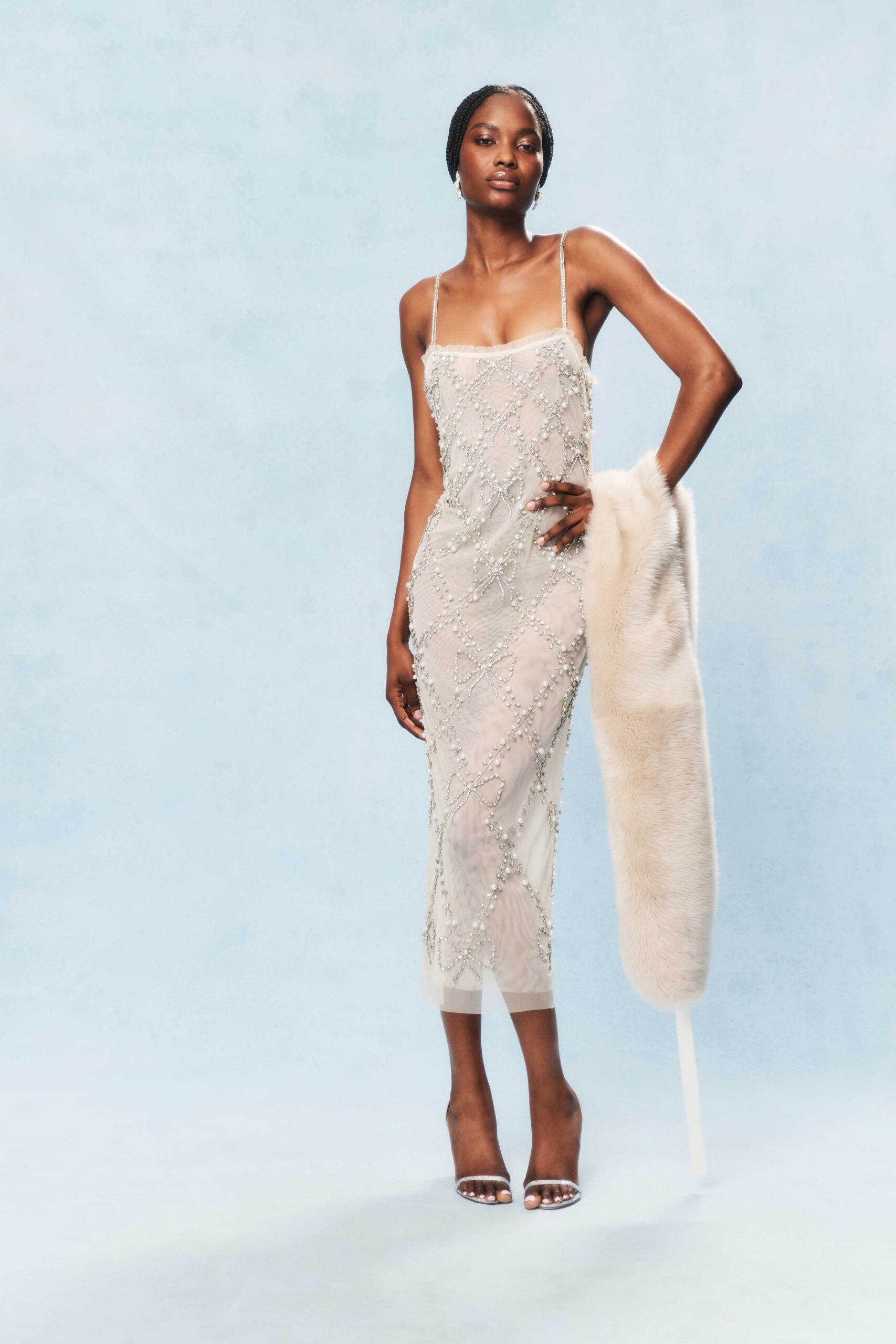white beaded midi dress with fur coat