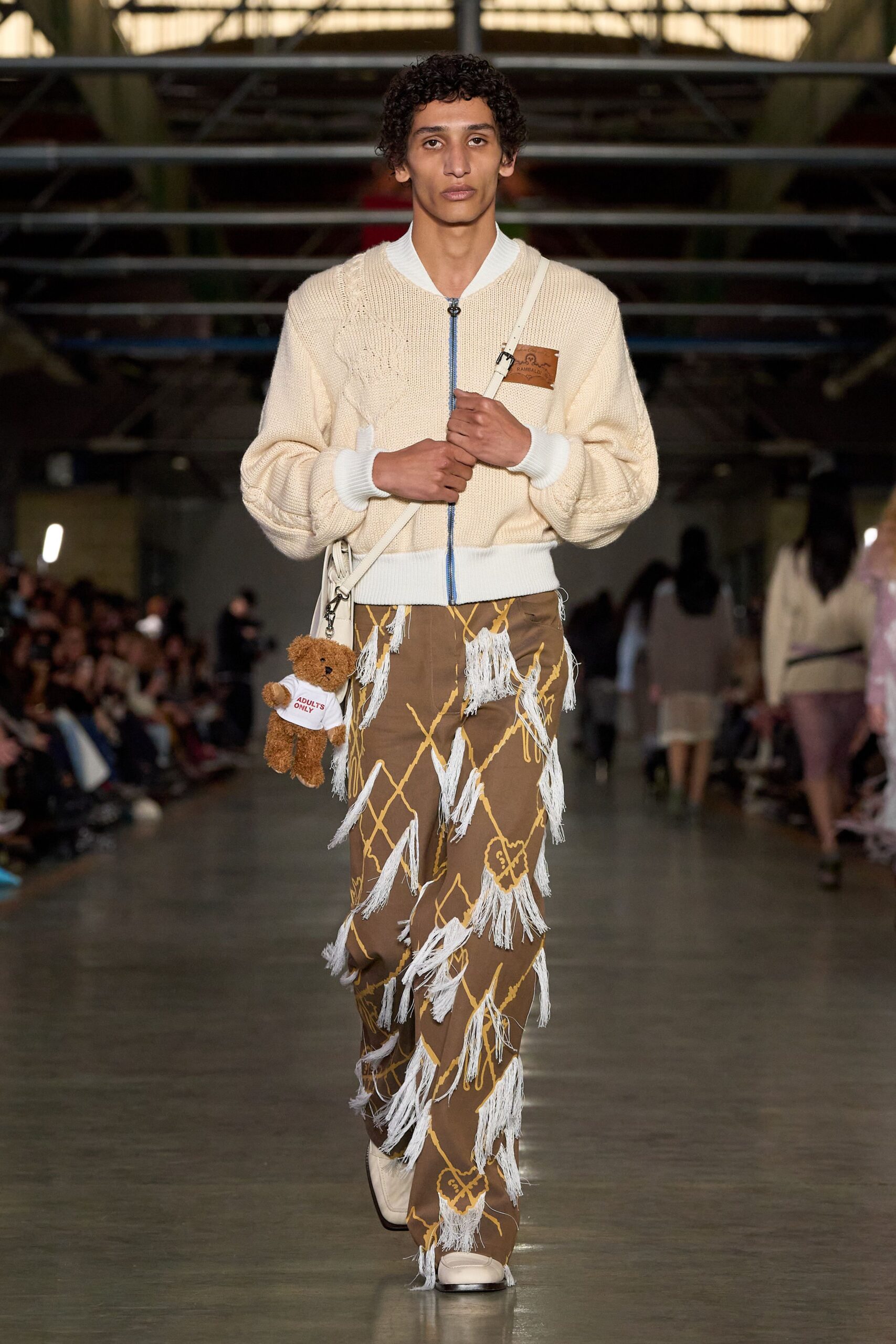 white fitted jacket with brown pants
