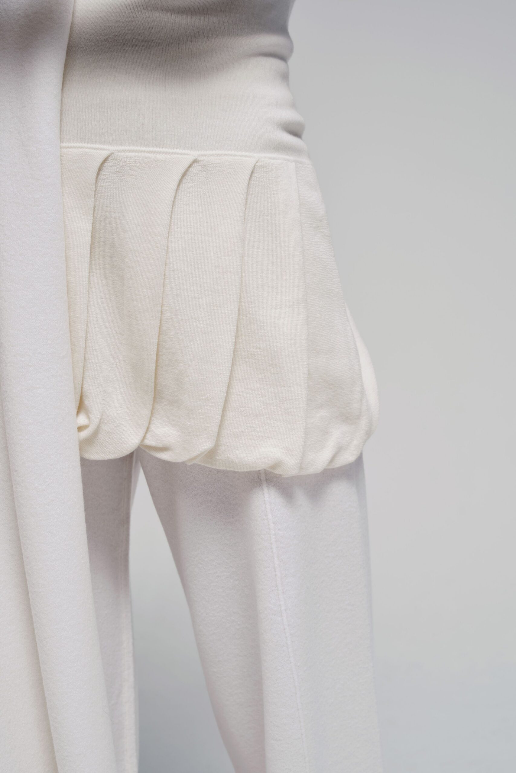 white fitted top and pants