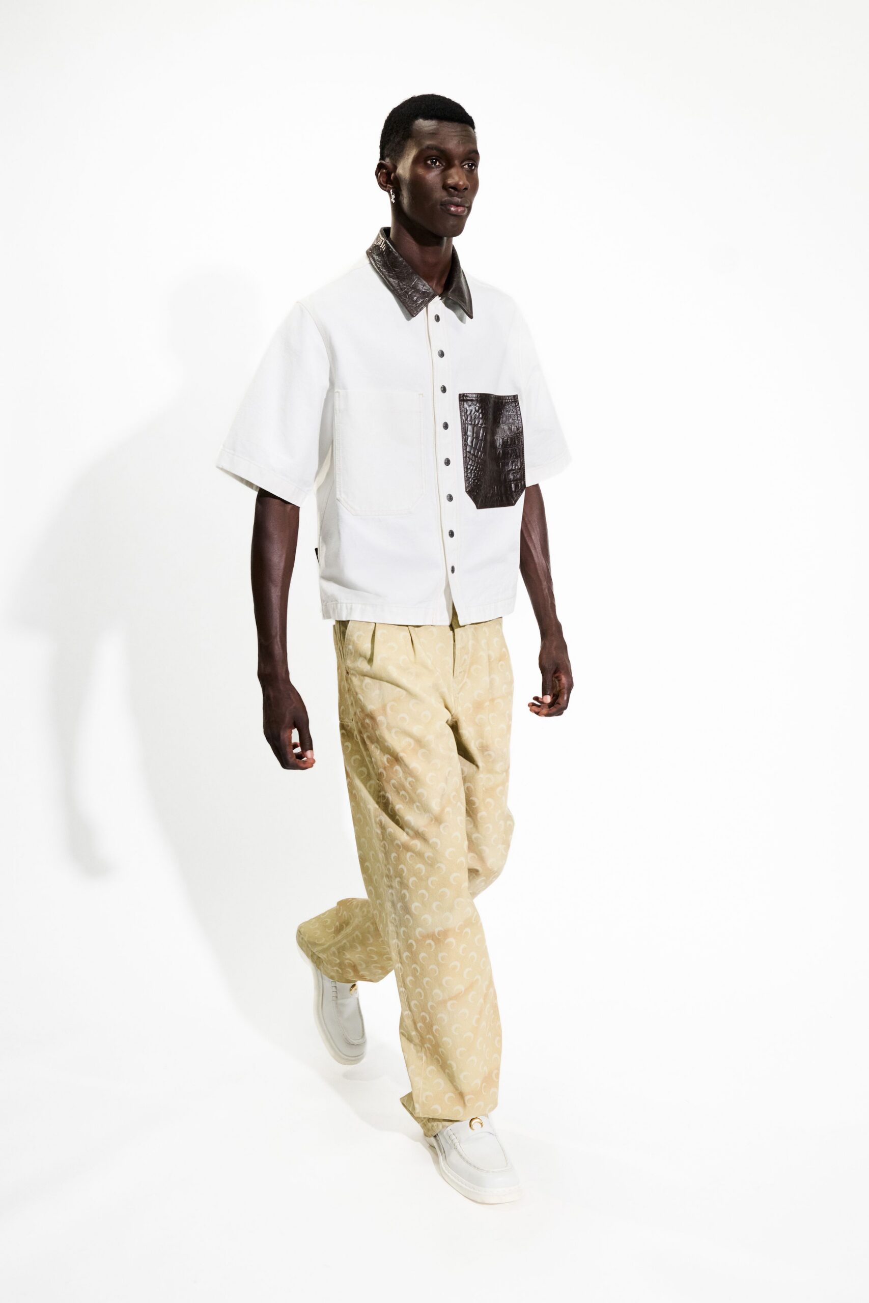 white shirt beige printed pants