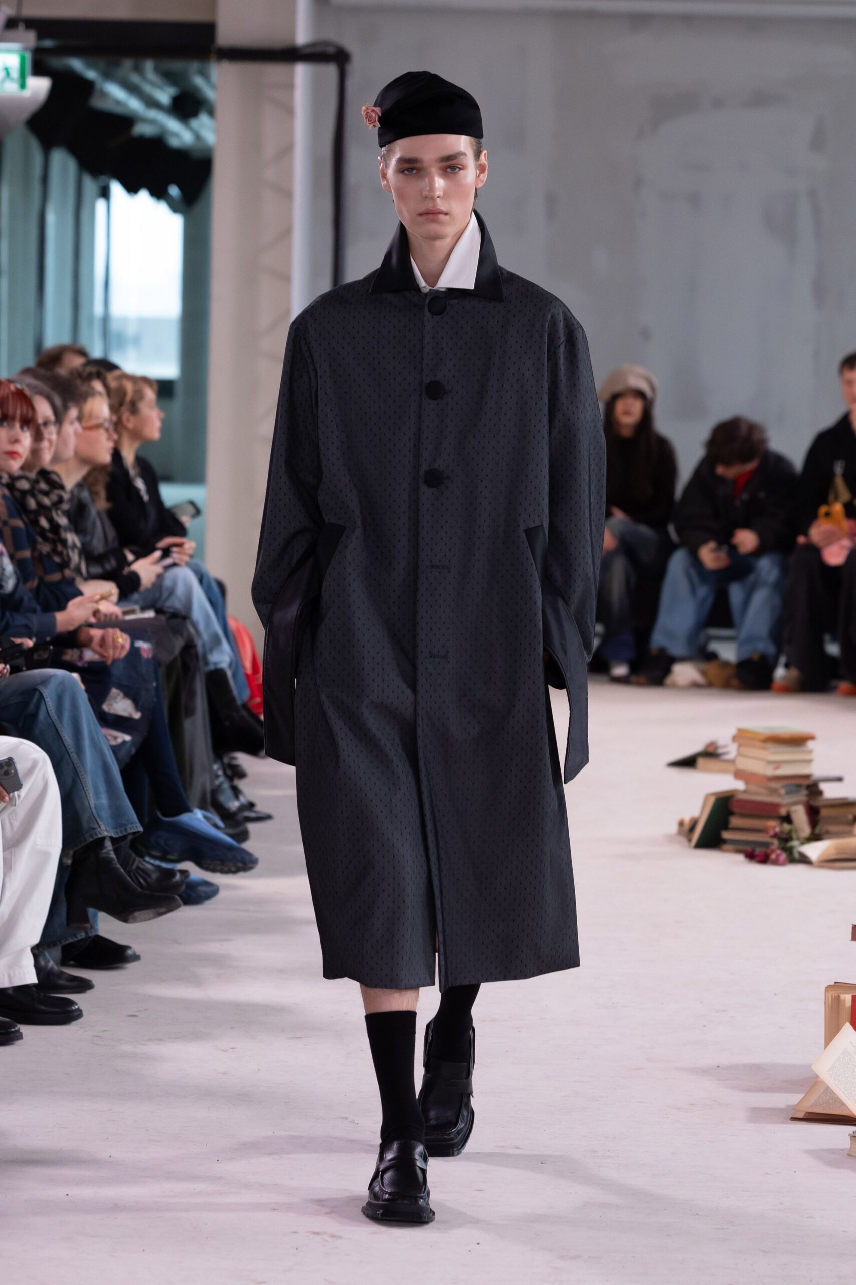 black relaxed coat with shoes and hat