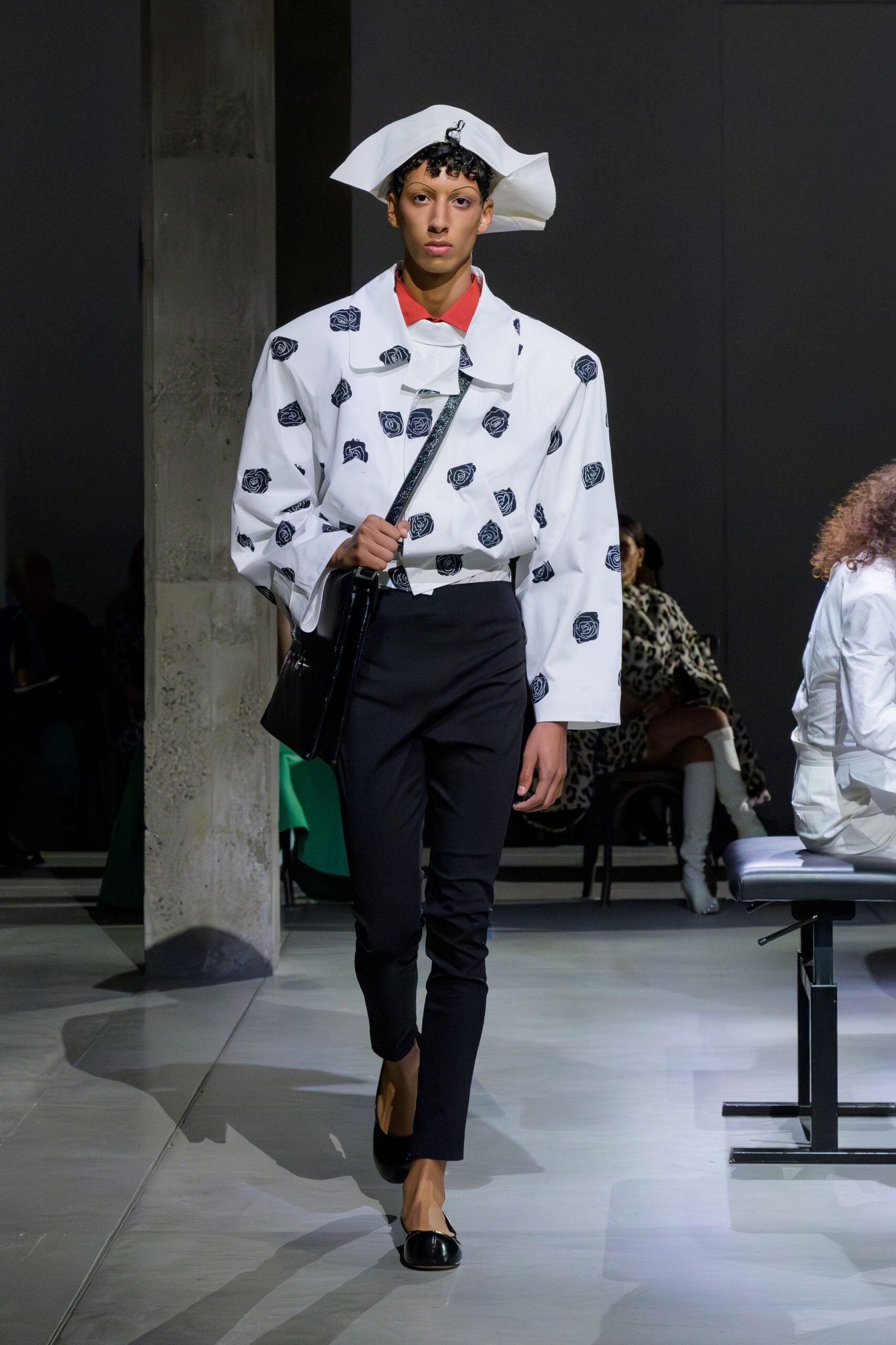 white printed shirt with black pants