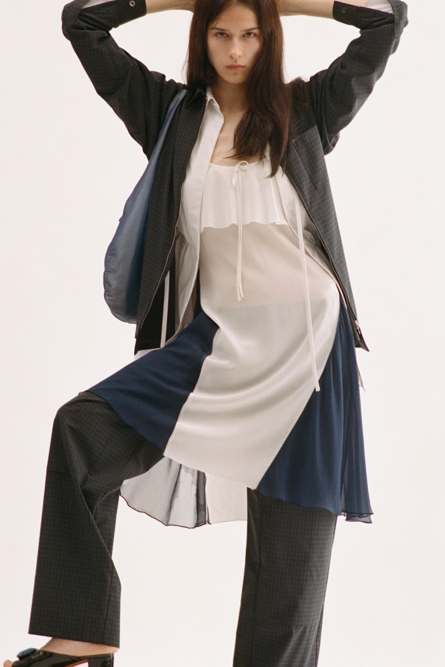 black cotton long-sleeve collared structured buttoned layered jacket
