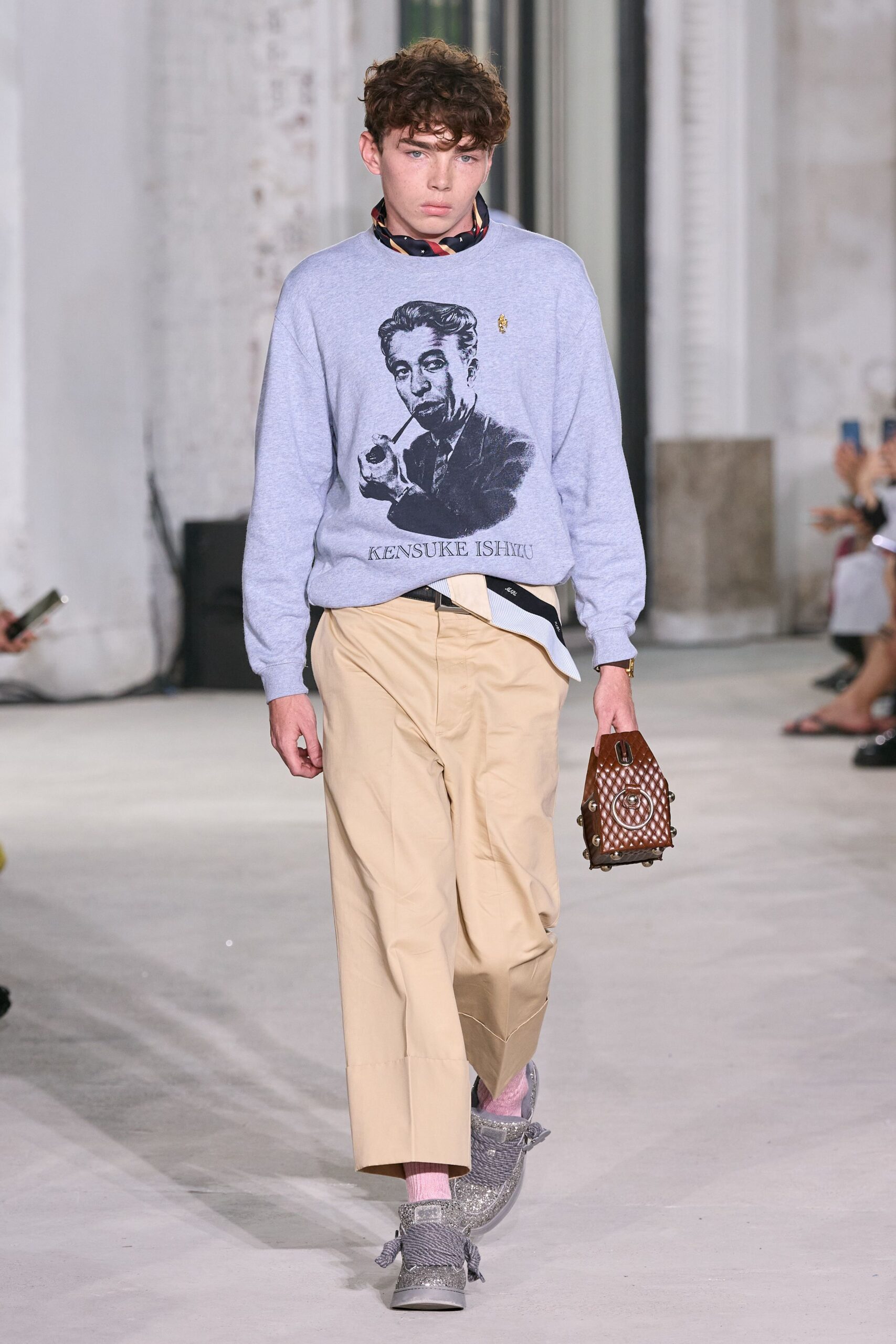 gray printed sweater with beige pants