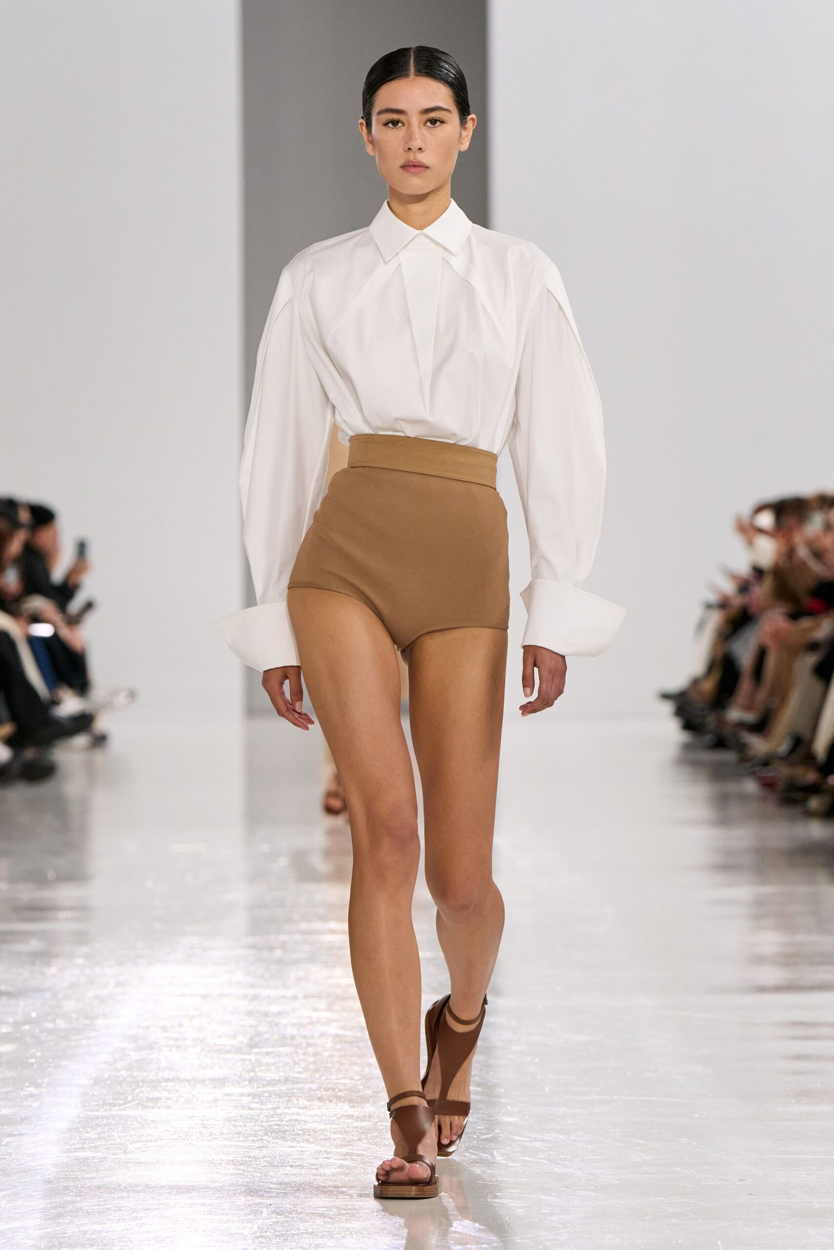 white relaxed shirt beige shorts