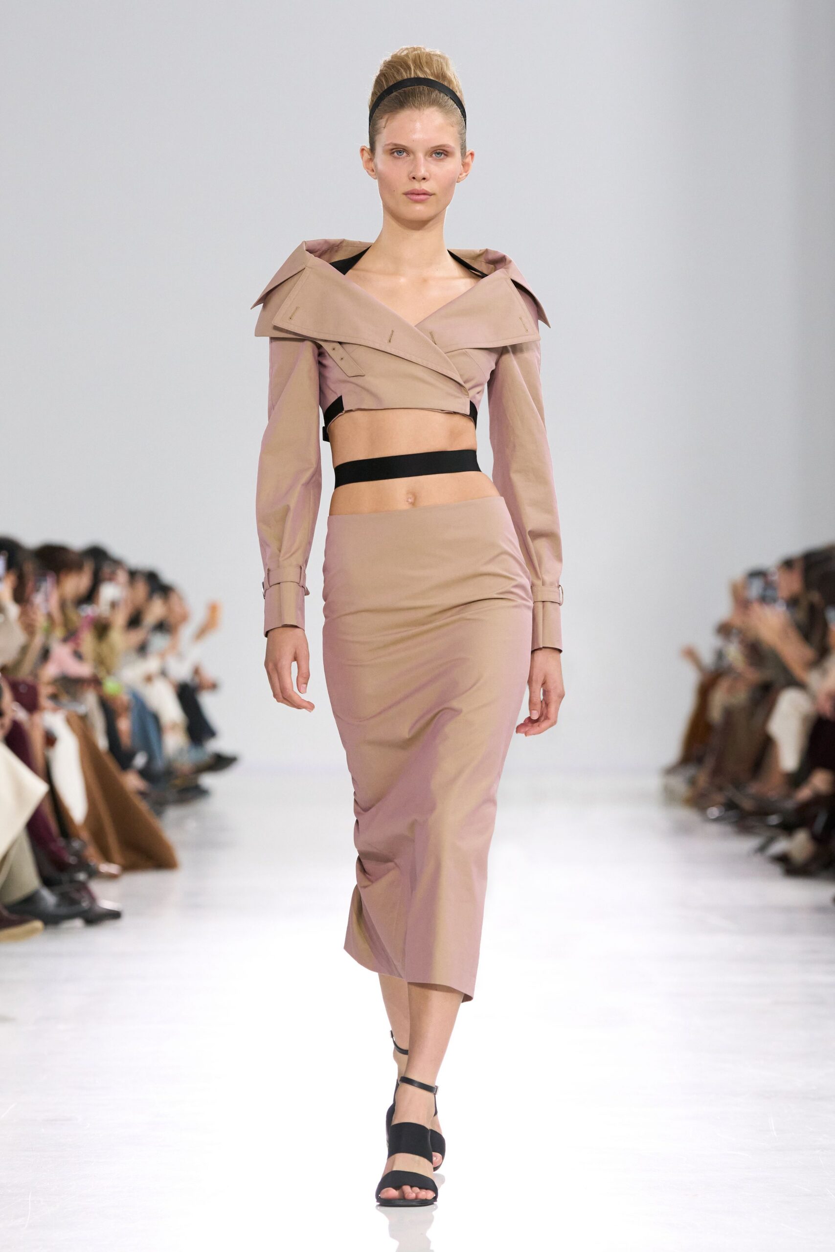 beige fitted top and skirt