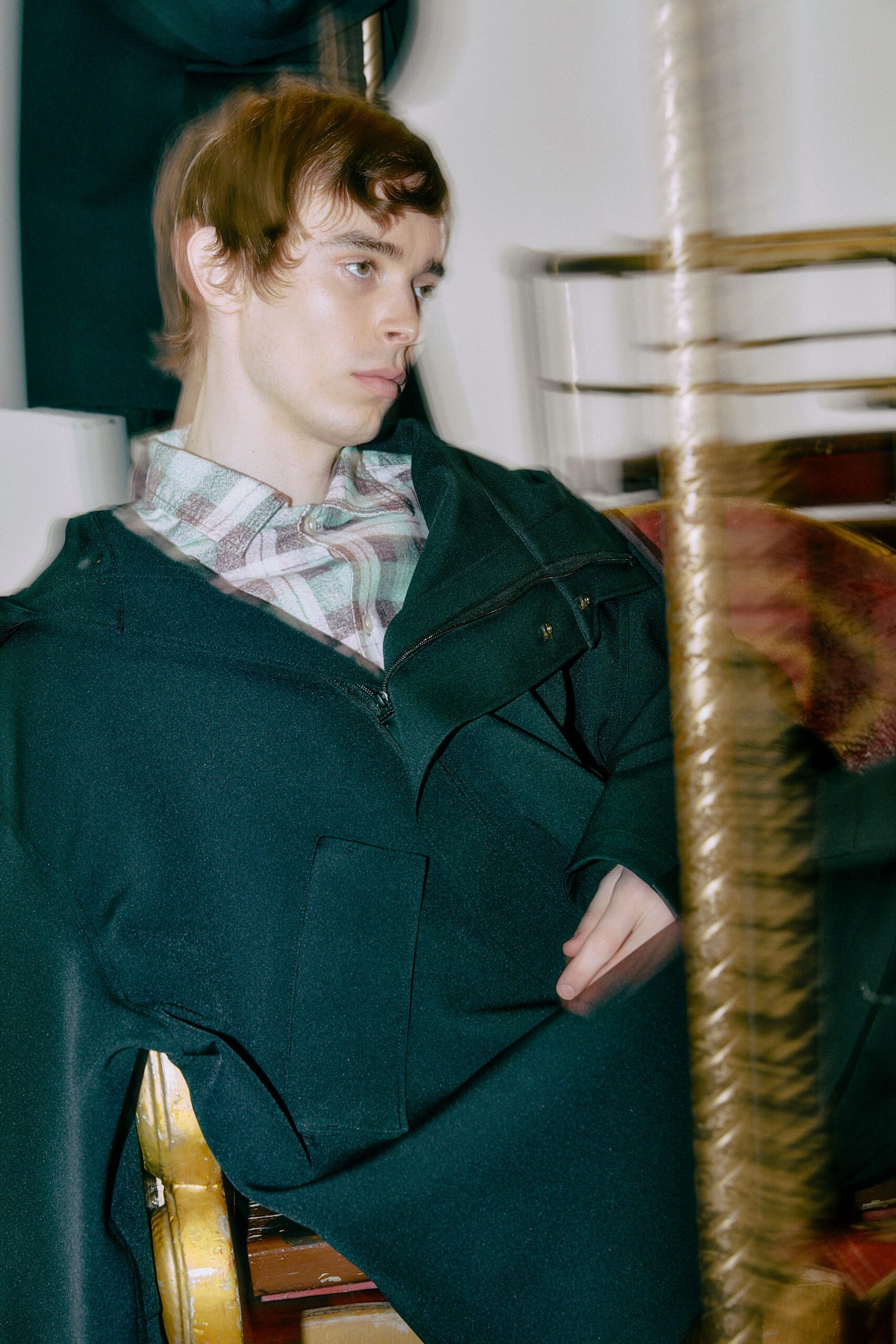 black wool relaxed coat and multi checked shirt