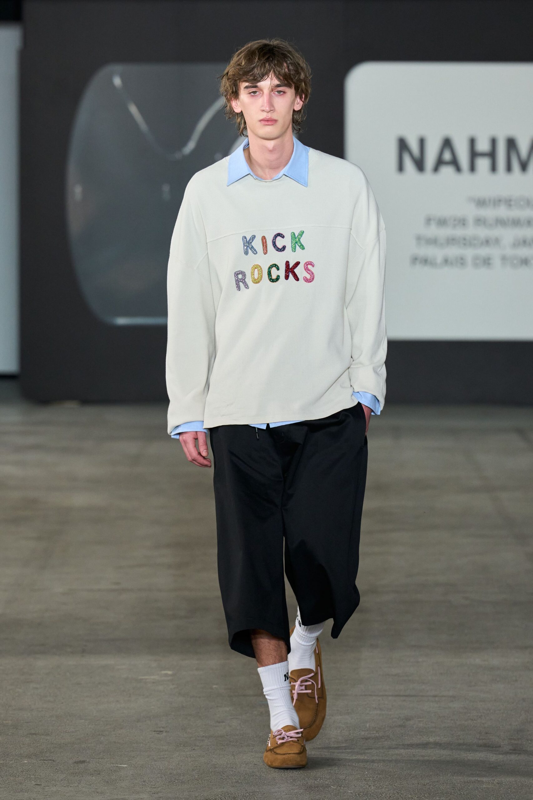 white relaxed sweater with printed detail