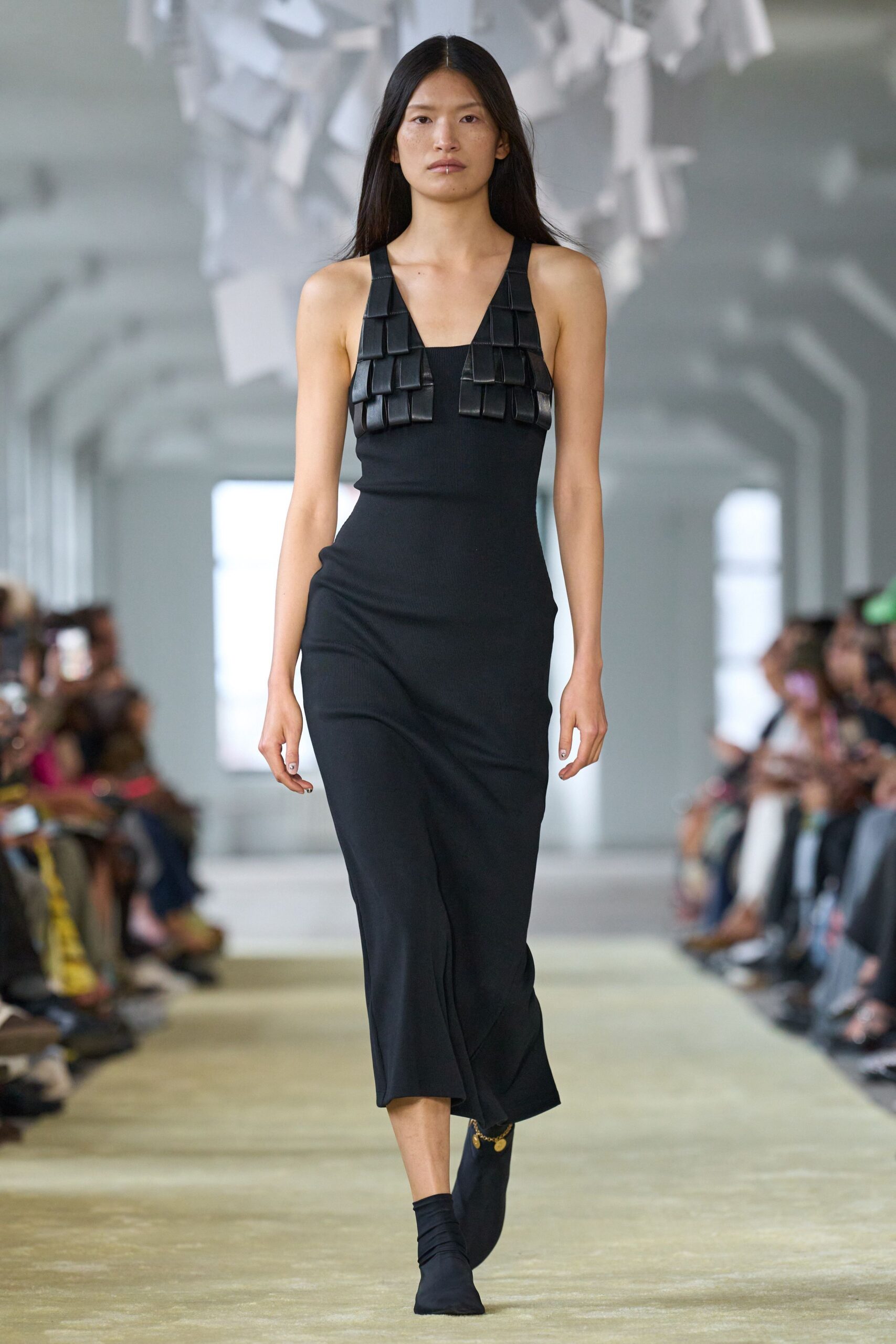 black fitted sleeveless midi dress