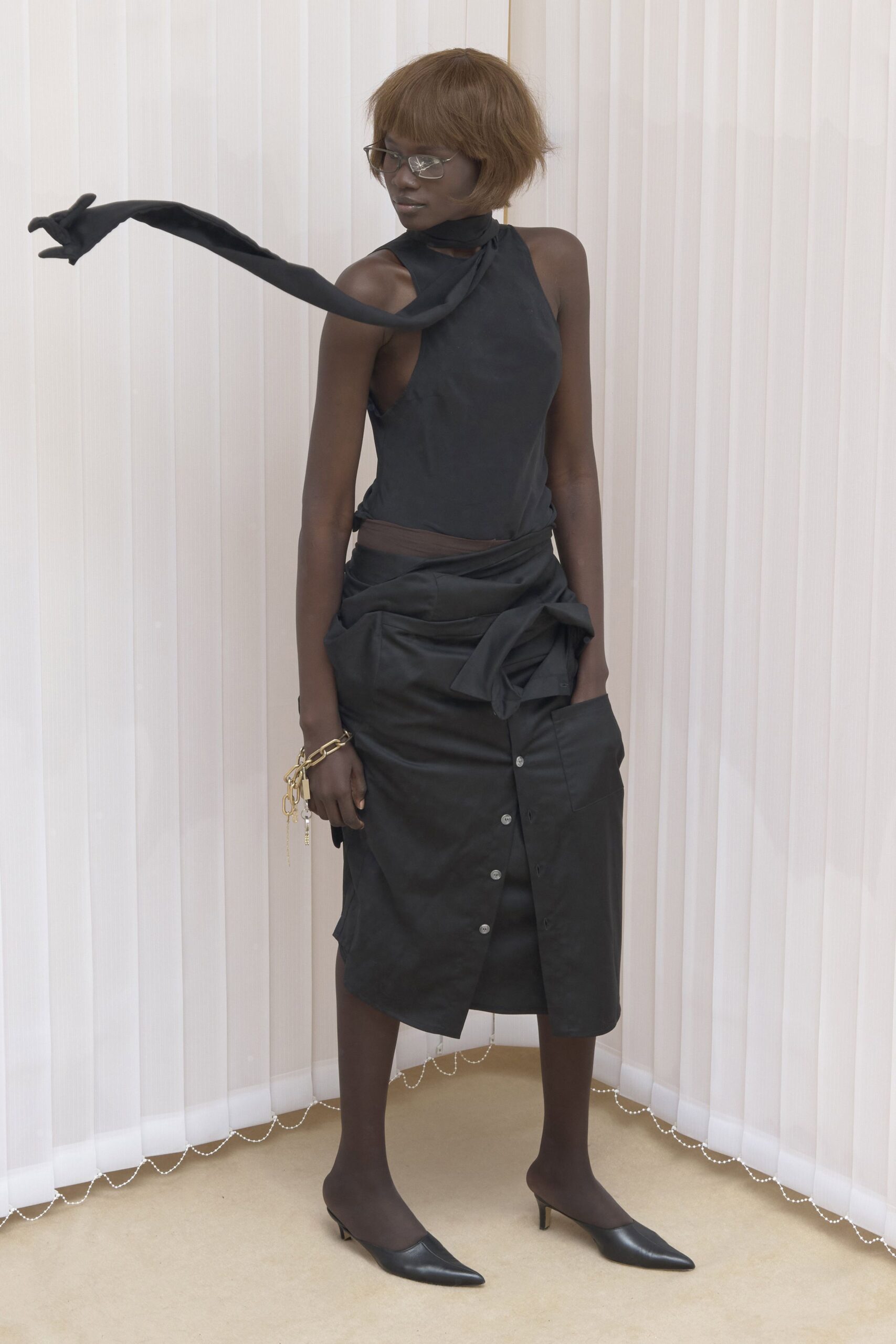 black fitted top and skirt