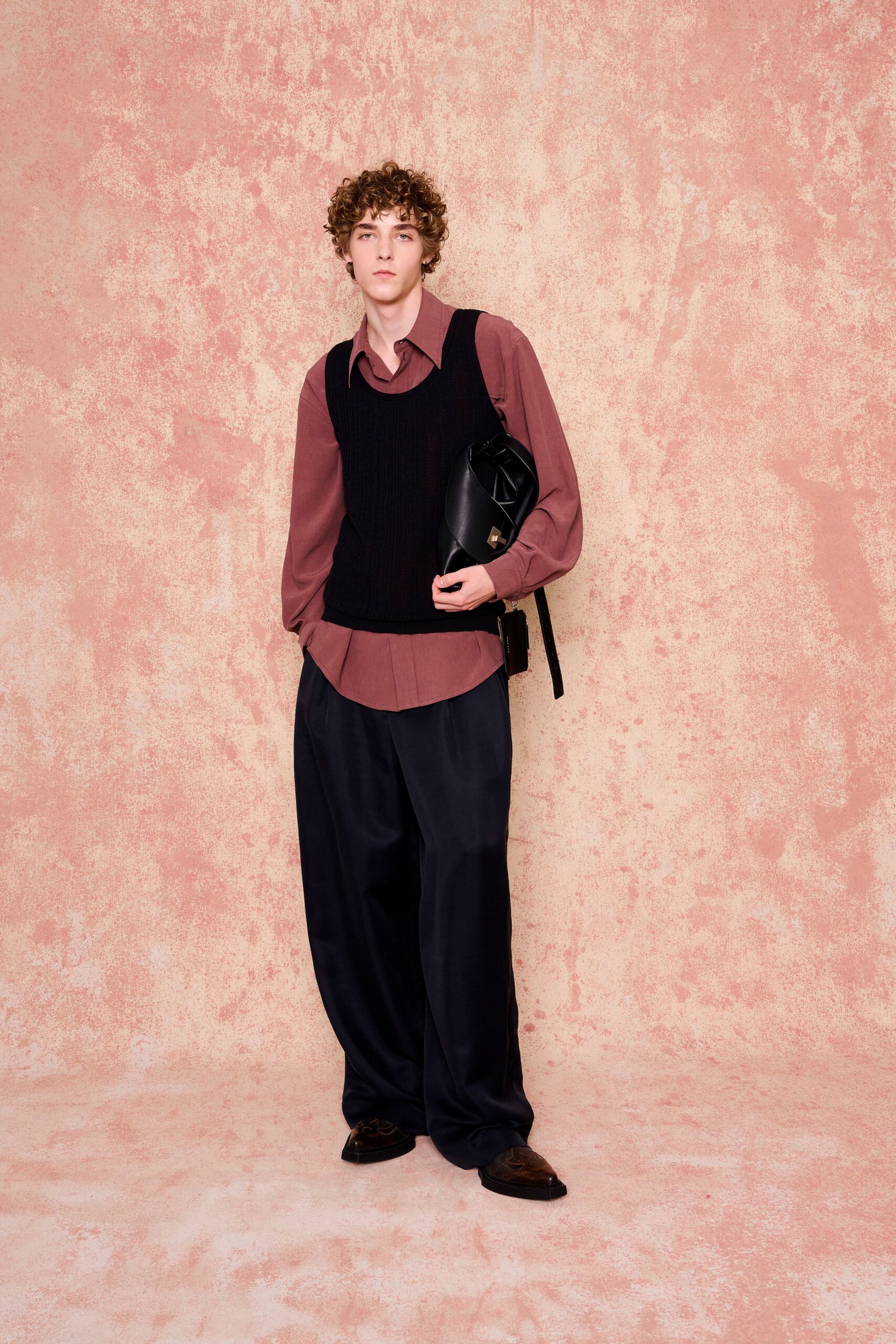 black vest red shirt relaxed pants