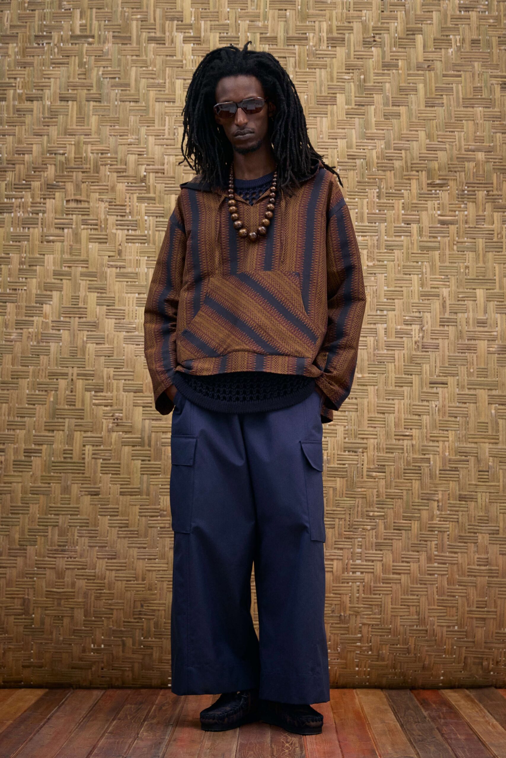 brown printed relaxed top with navy cargo pants