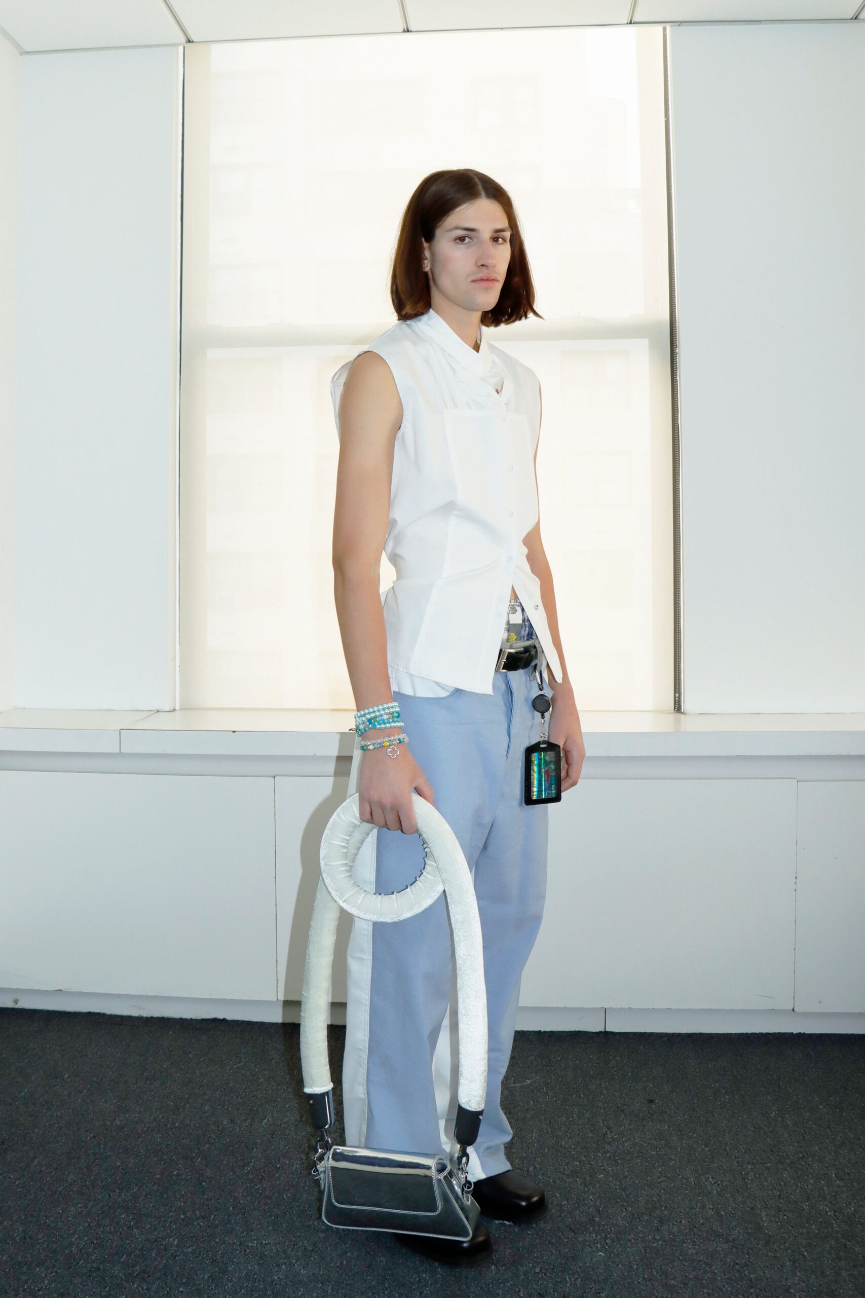 white fitted shirt with blue pants